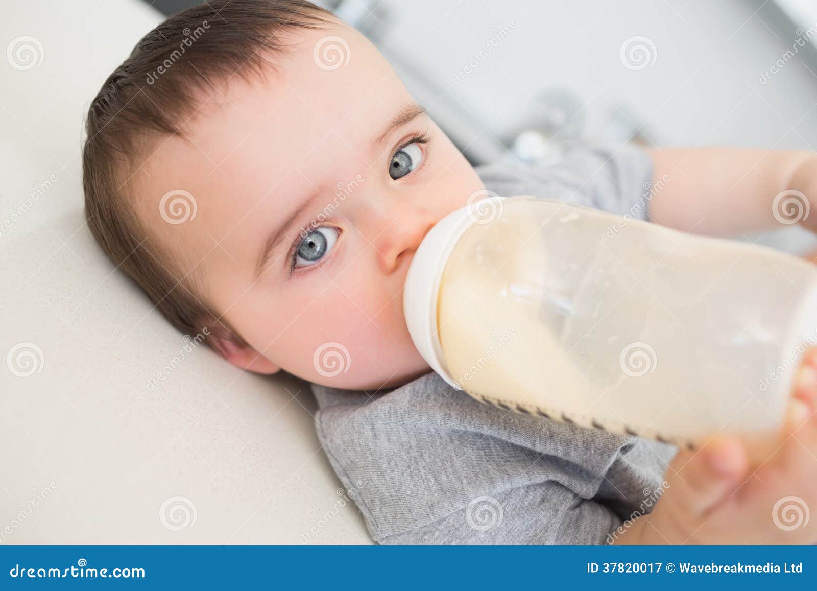 Baby Drinking Milk while Lying on Counter Stock Image Image of sweet
