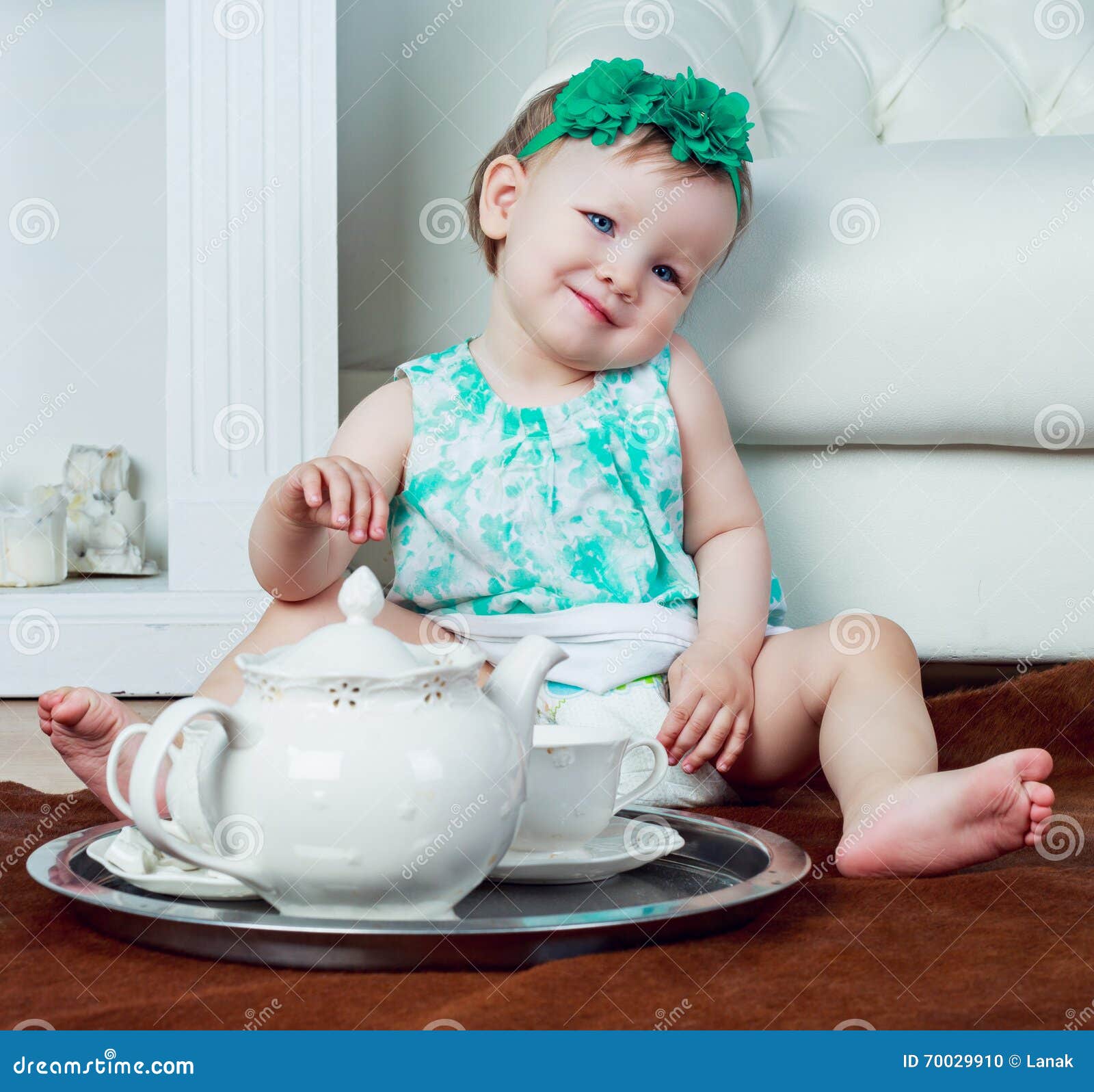 Baby drinking tea stock photo. Image of interior, home 70029910