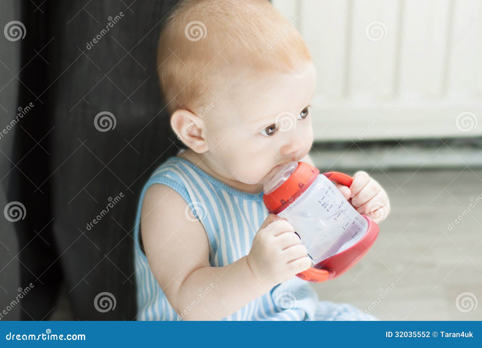 Baby Drinking Water from Bottle Stock Photo Image of adorable