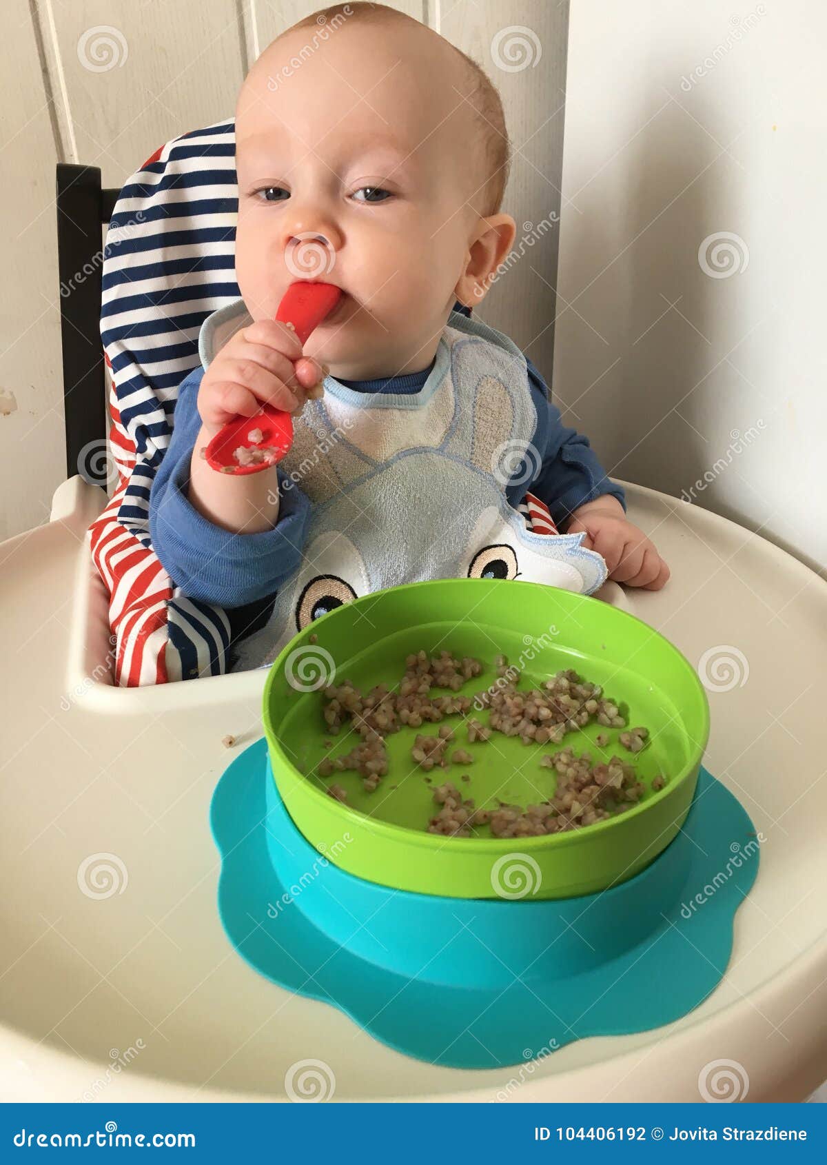 Baby eating stock photo. Image of groats, stool, buckwheat 104406192