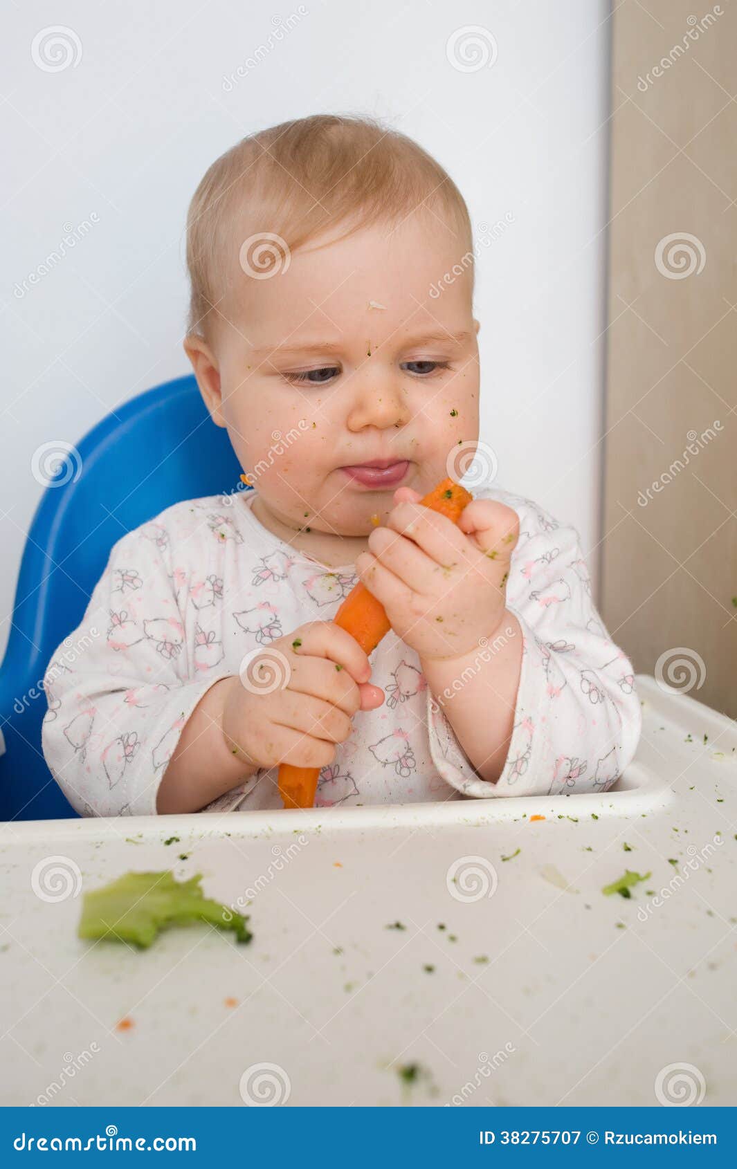 Baby eating carrot stock image. Image of little, meal 38275707