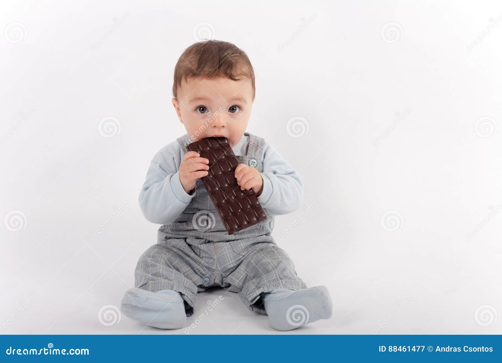 Baby eating chocolate stock image. Image of child, space 88461477