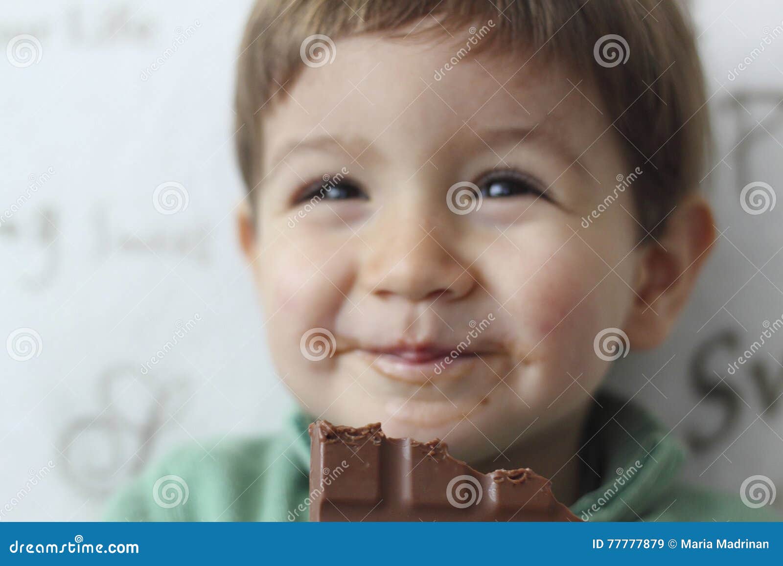 Baby Eating Chocolate Wallpaper