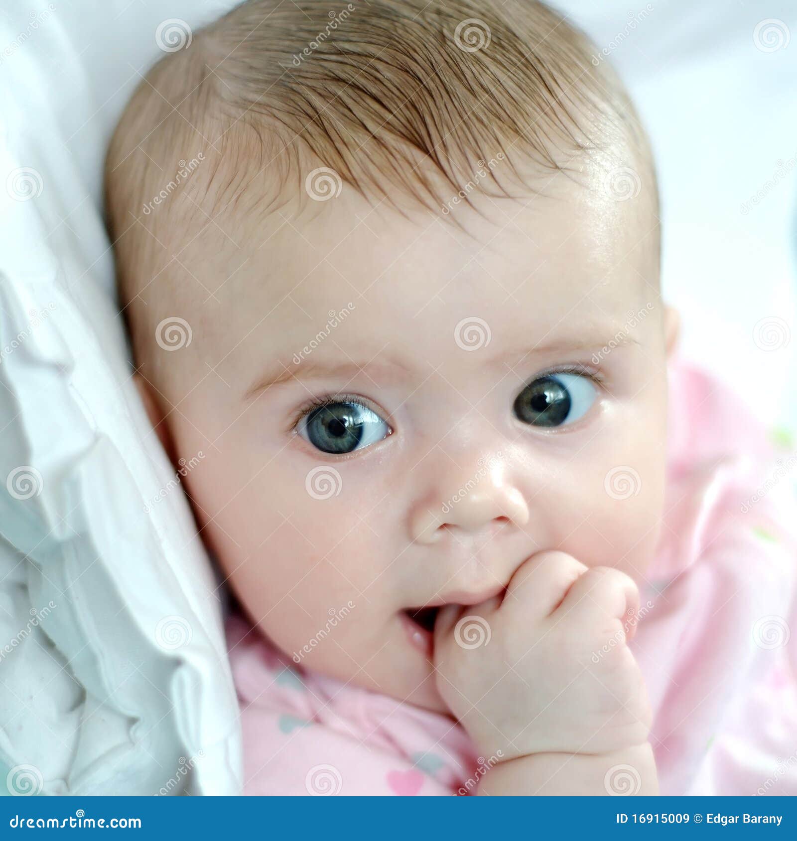 Baby eating hand stock image. Image of child, peace, relax 16915009