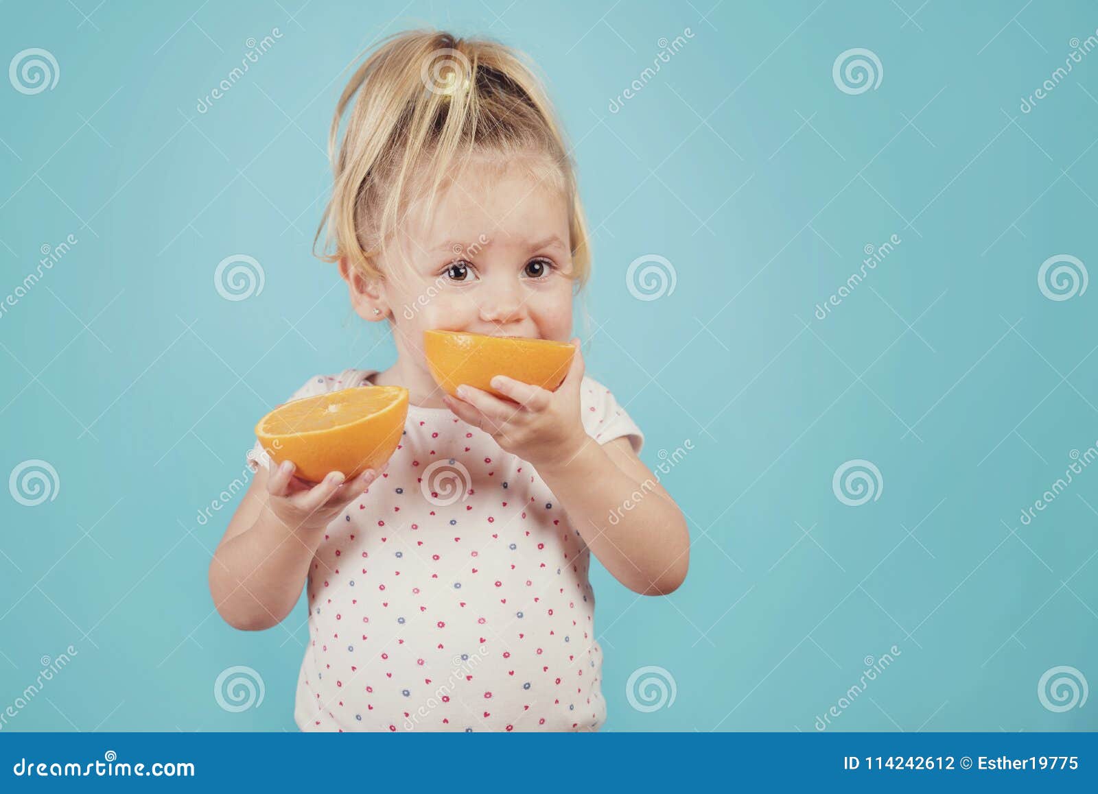 Baby eating an orange stock photo. Image of cool, juice - 114242612