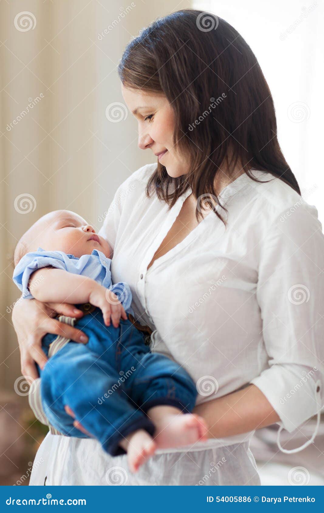 Baby Falling Asleep in the Arms of Her Mother Stock Photo Image of