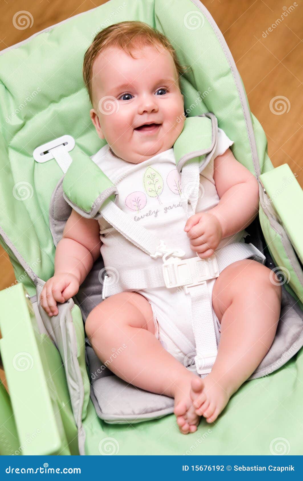 Baby in feeding chair stock photo. Image of baby, cute 15676192