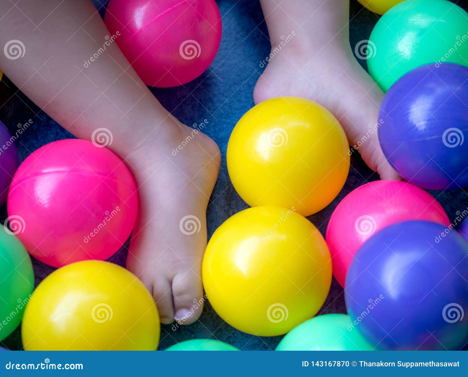 Baby Feet with Colorful Balls Stock Photo Image of kids, little