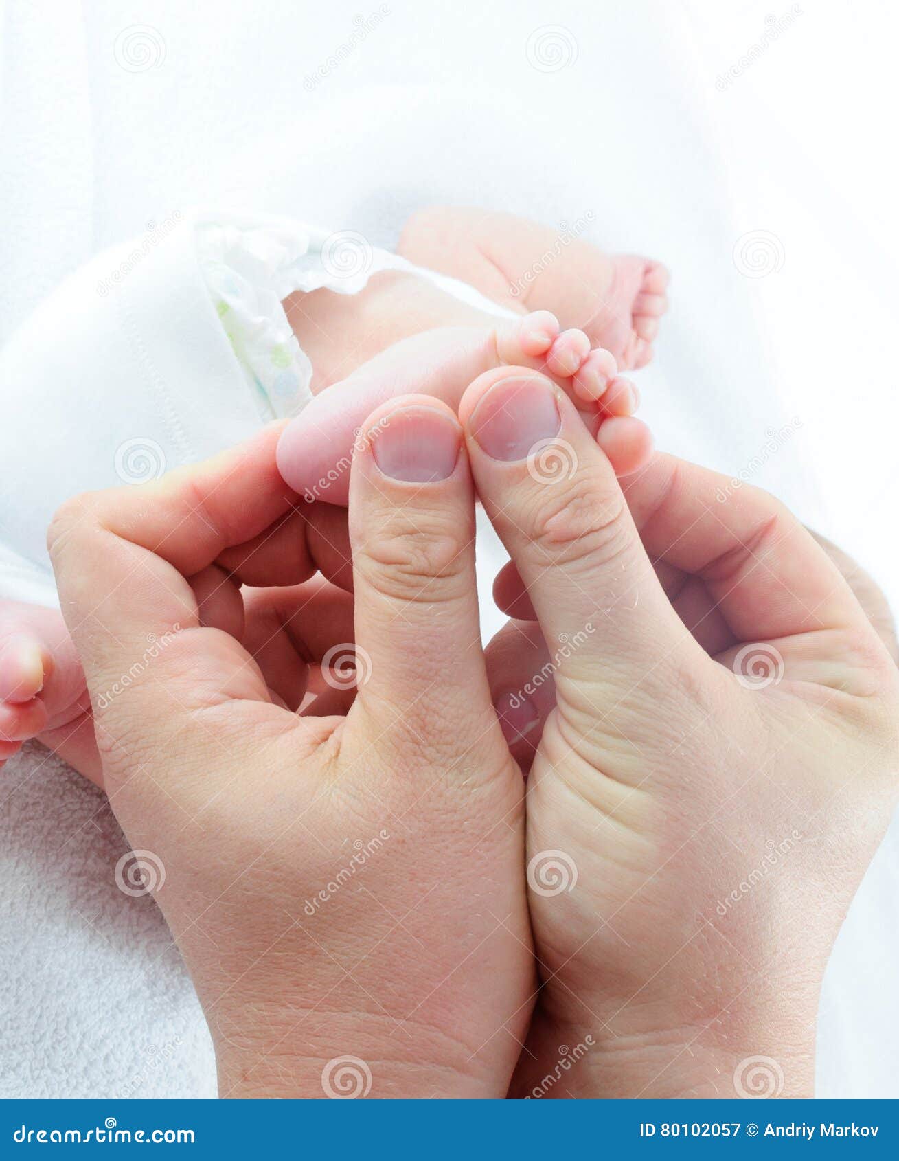 Baby feet. Newborn feet with parent s hand