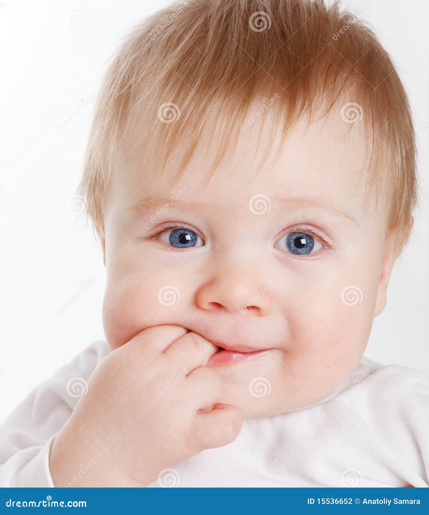 Baby with fingers in mouth stock photo. Image of fingers 15536652