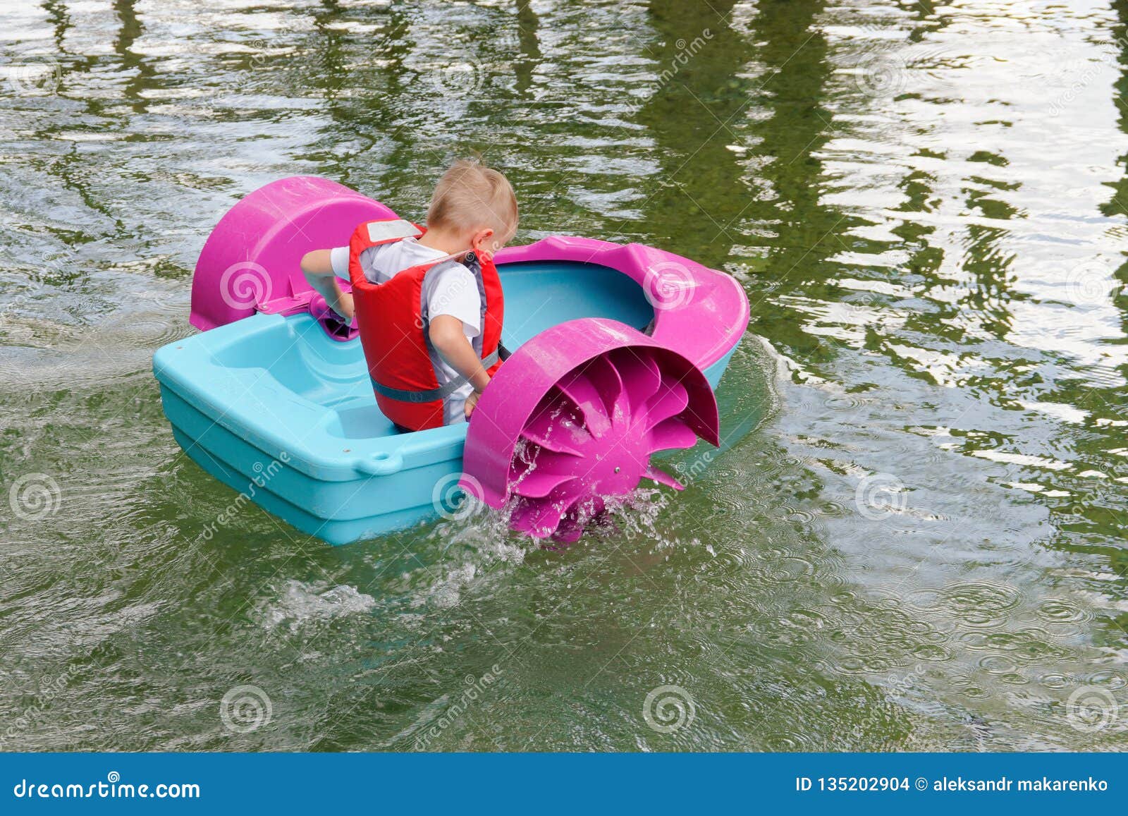 Baby Floats on a Toy Baby Boat. Attraction Stock Photo Image of