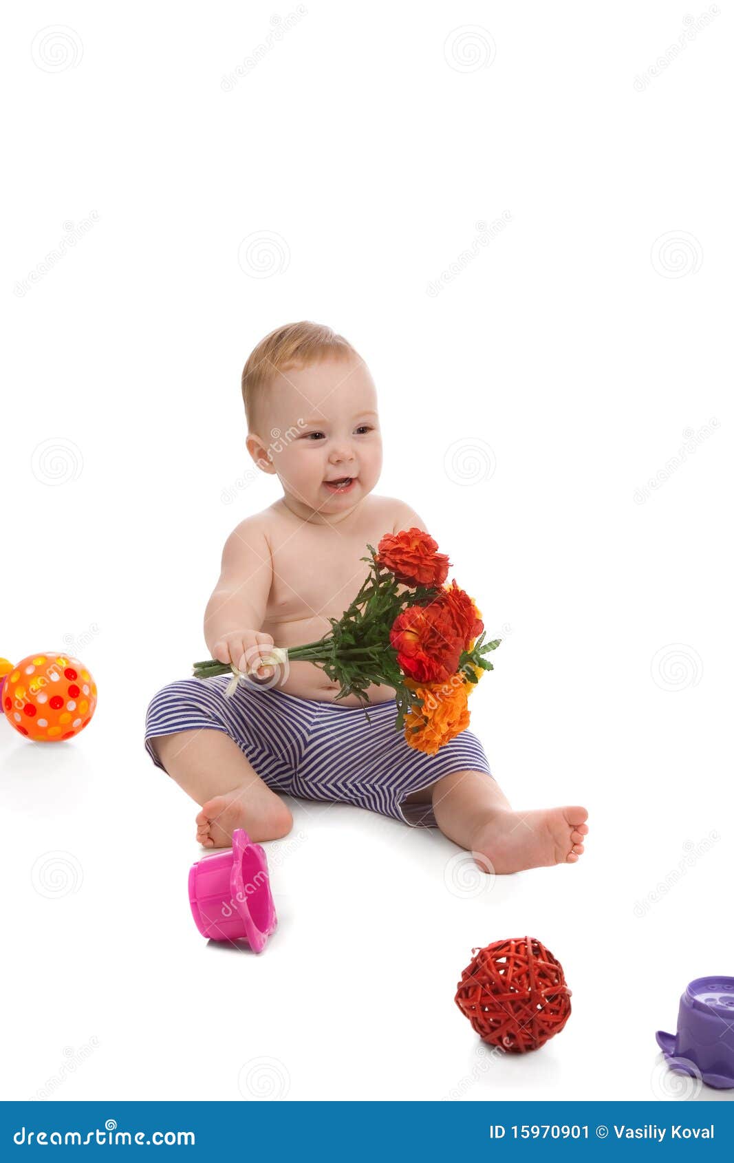 Baby with flowers stock image. Image of innocence, girl 15970901