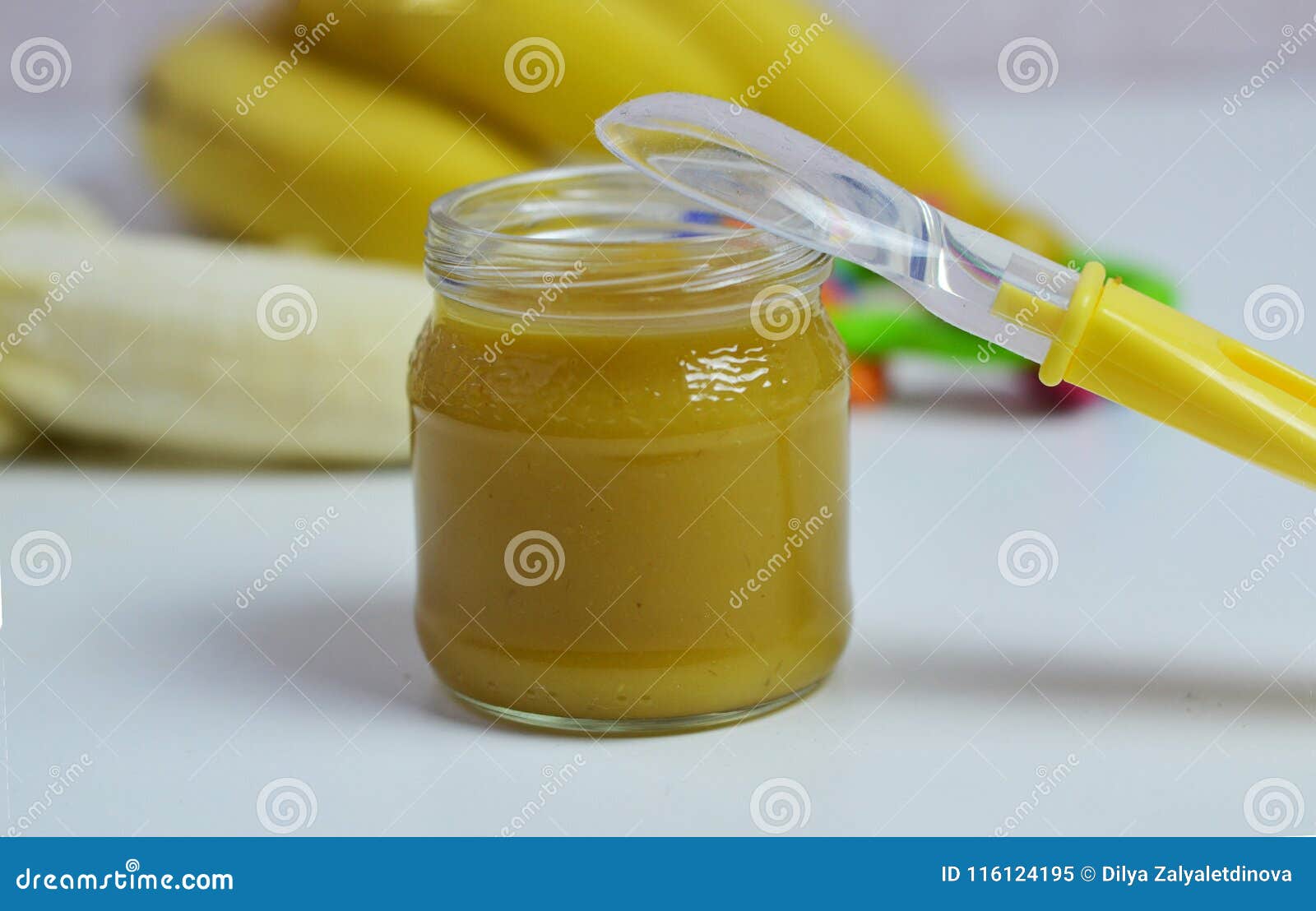 Baby Food, Banana Mashed Potatoes and Bananas on a White Background it ...