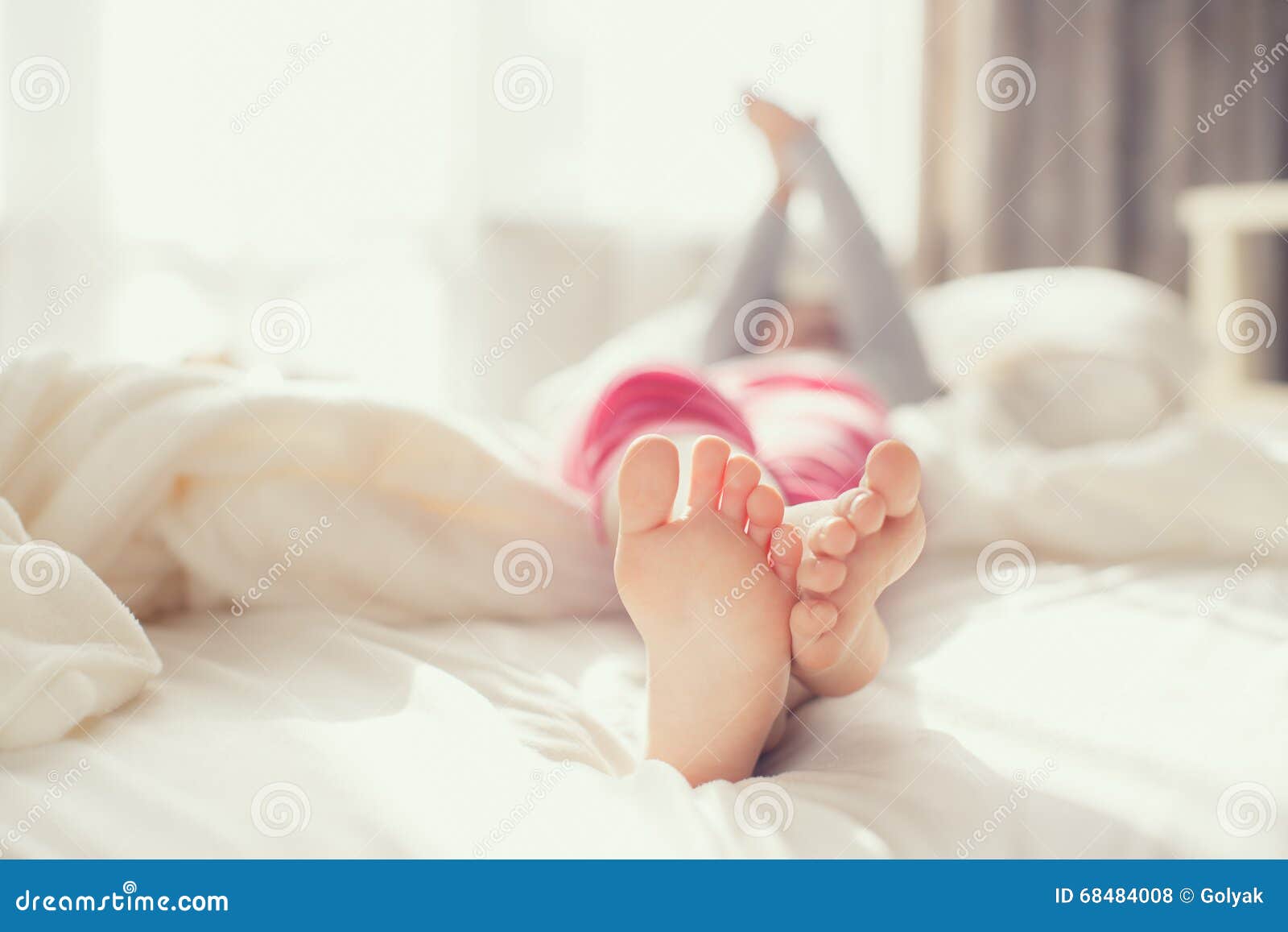 2,968 Little Girl Feet Bed Stock Photos photo