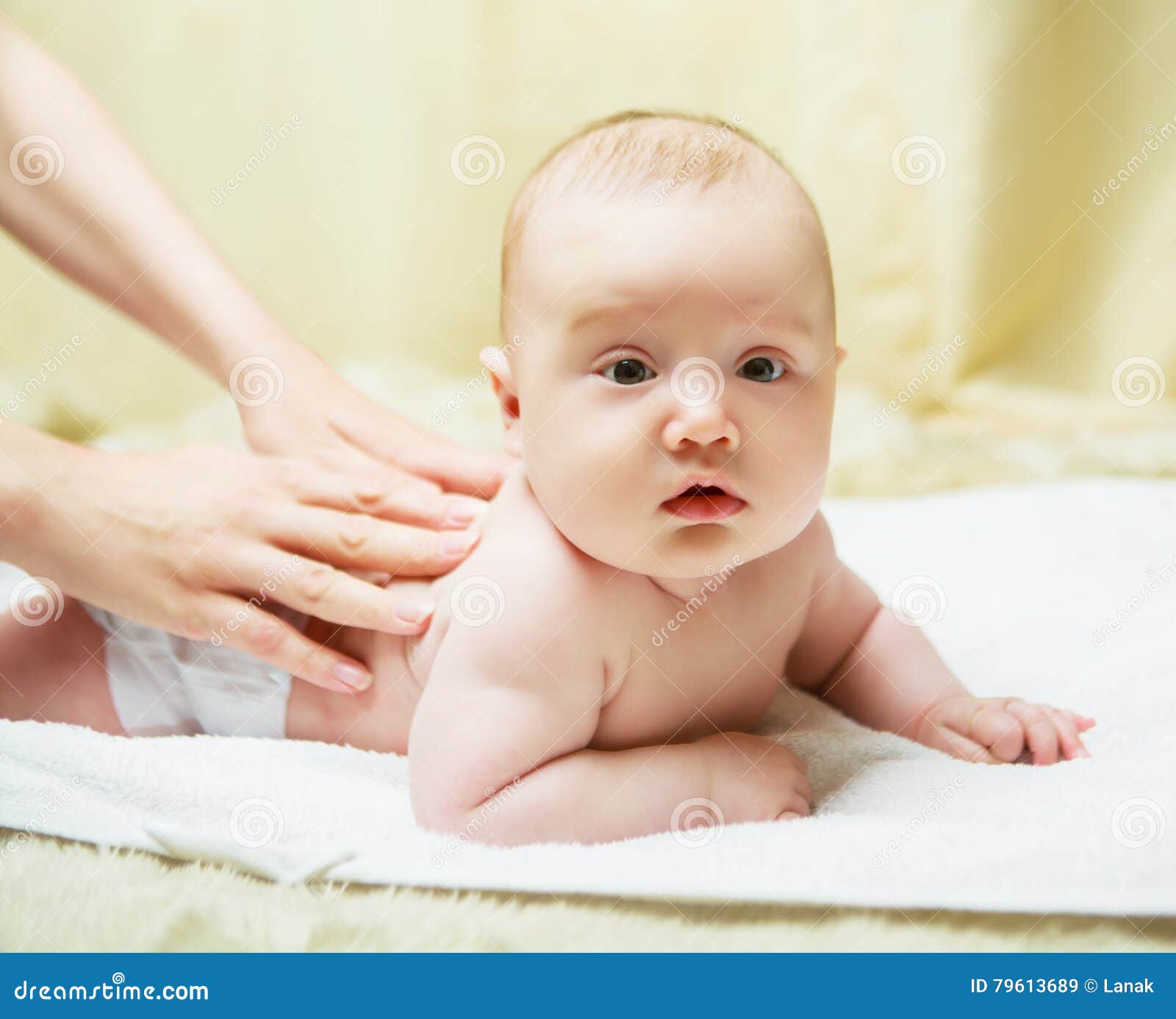 Baby getting massage stock image. Image of childhood 79613689