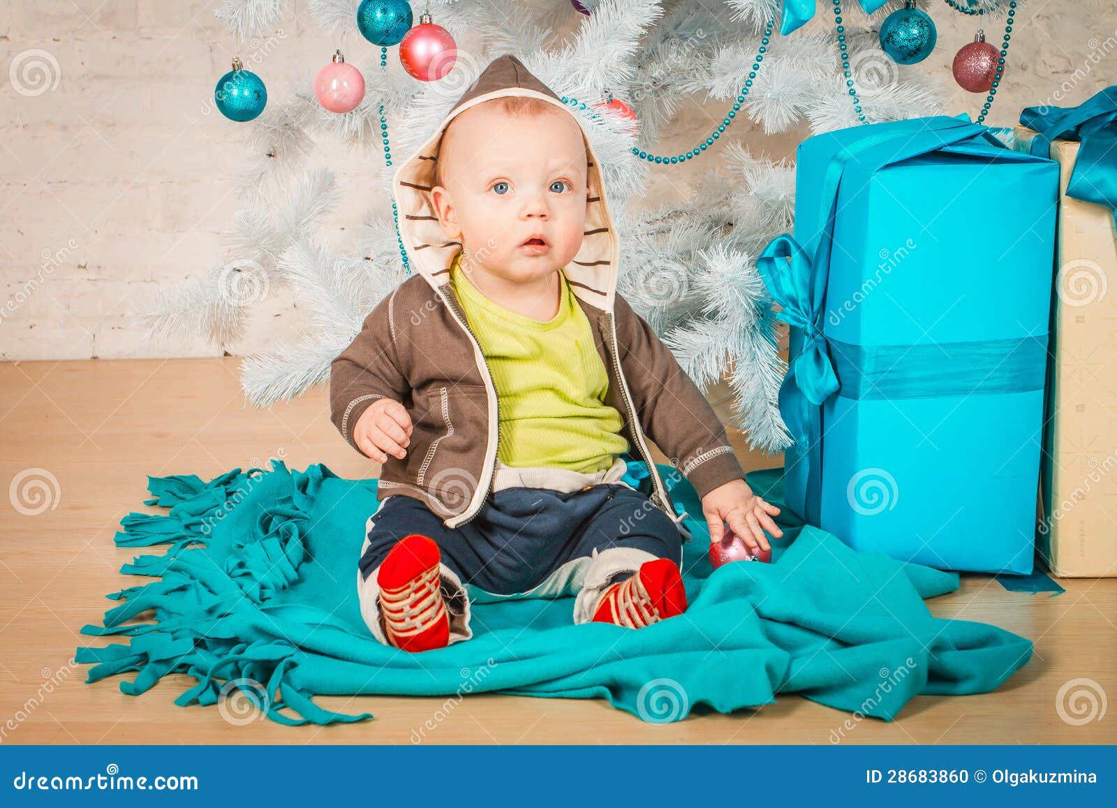 A Baby with Gifts at Christmas Tree Stock Photo Image of festive, happiness 28683860
