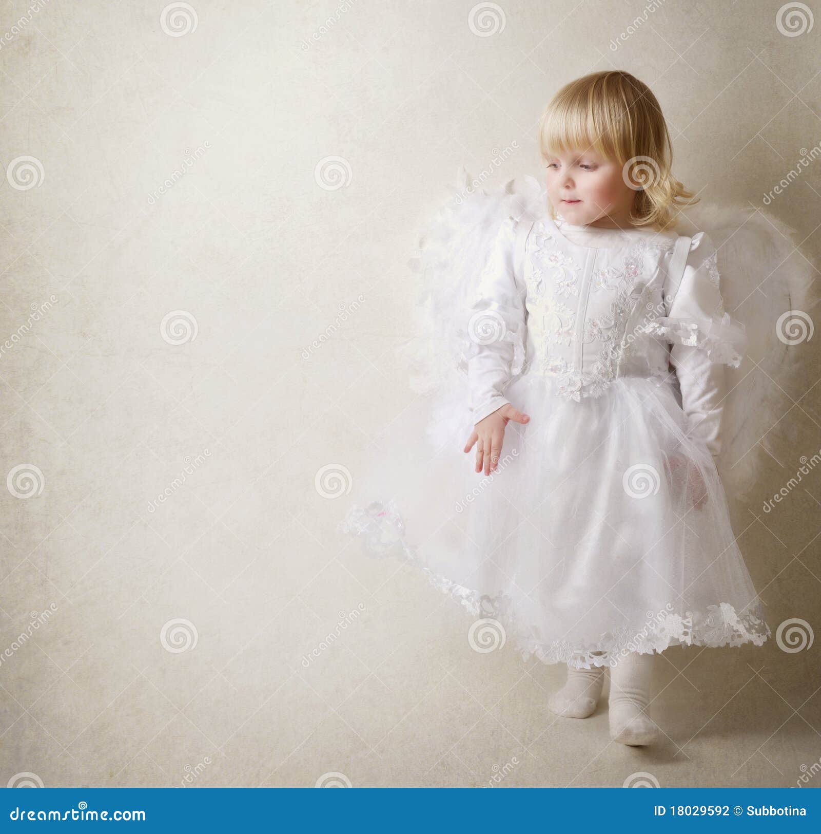 Portrait of beautiful woman with white angel wings on Sensual beautiful  blonde with white wings and short dress  CanStock