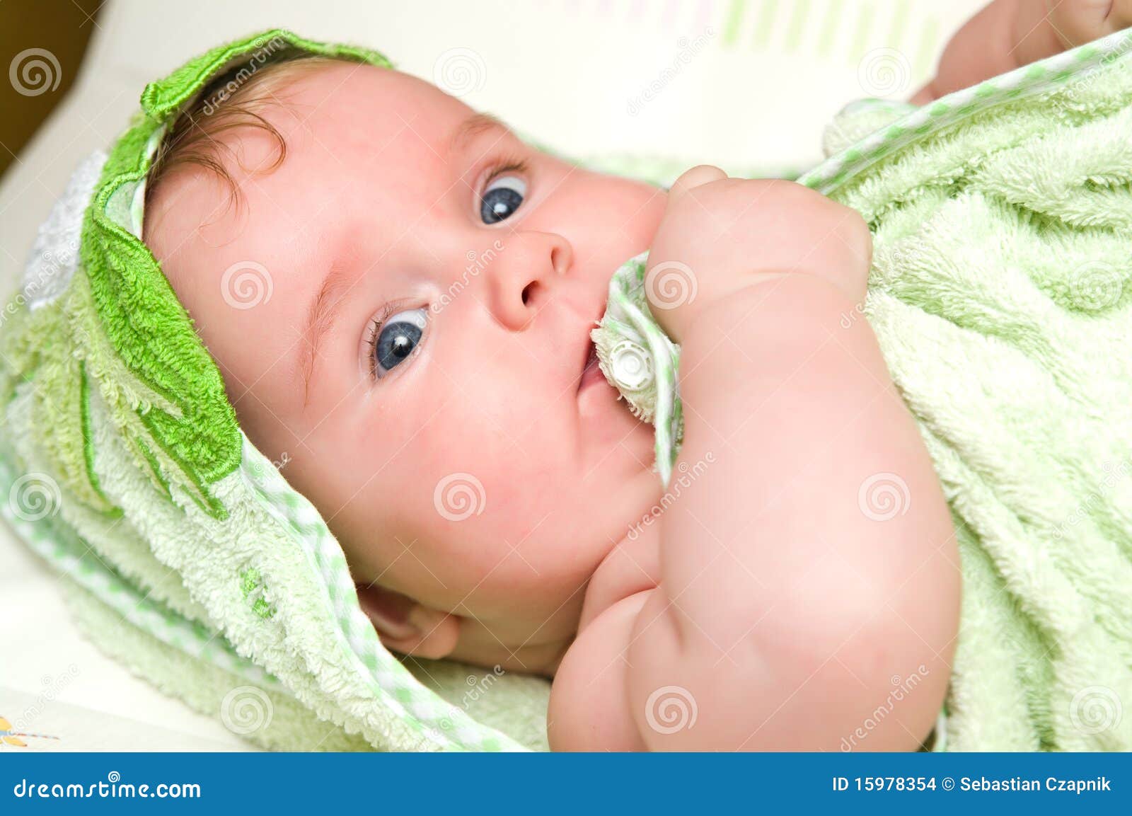 Baby girl with bath towel stock photo. Image of closeup 15978354