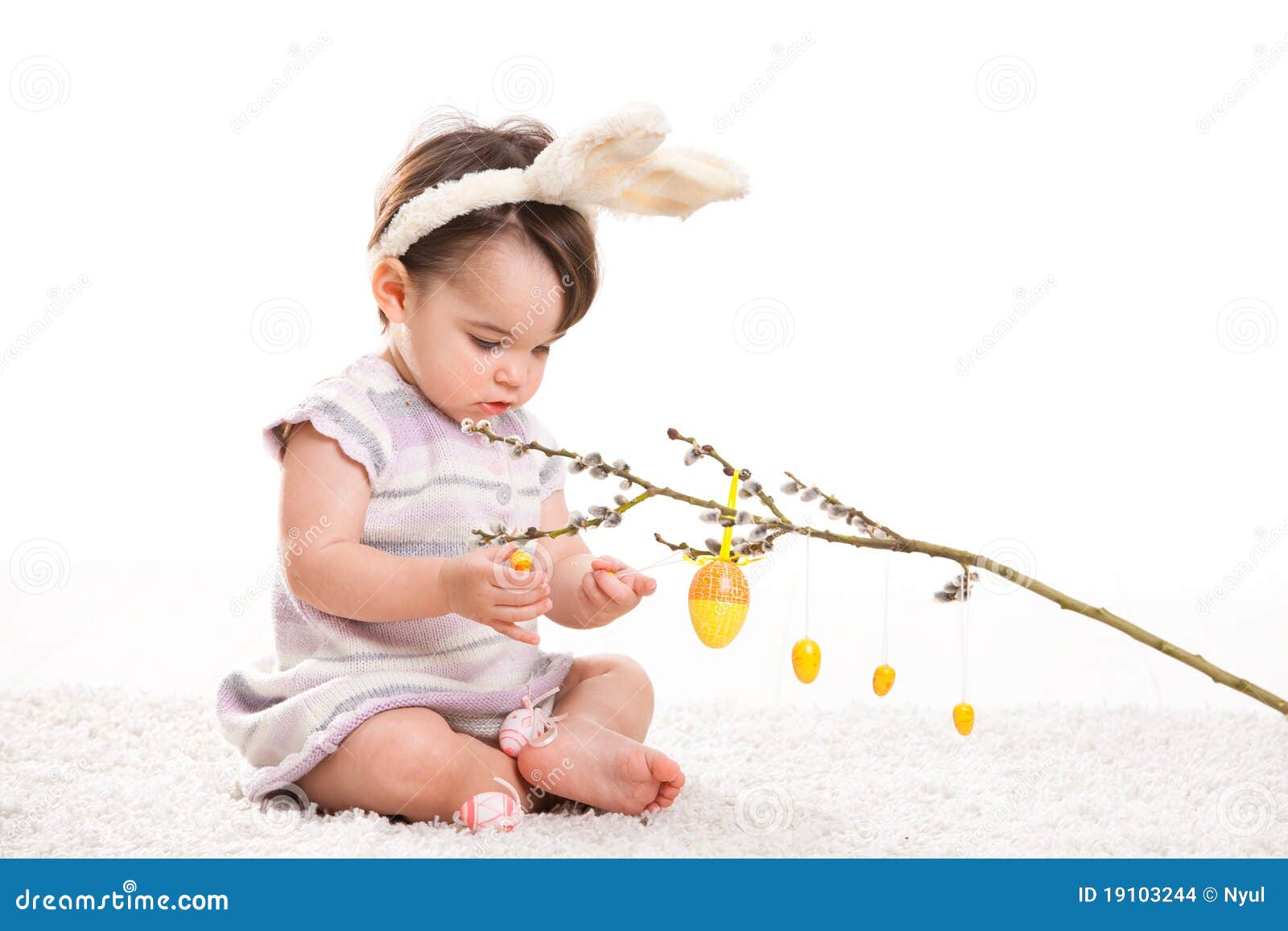 Baby girl with bunny ears stock photo. Image of female 19103244