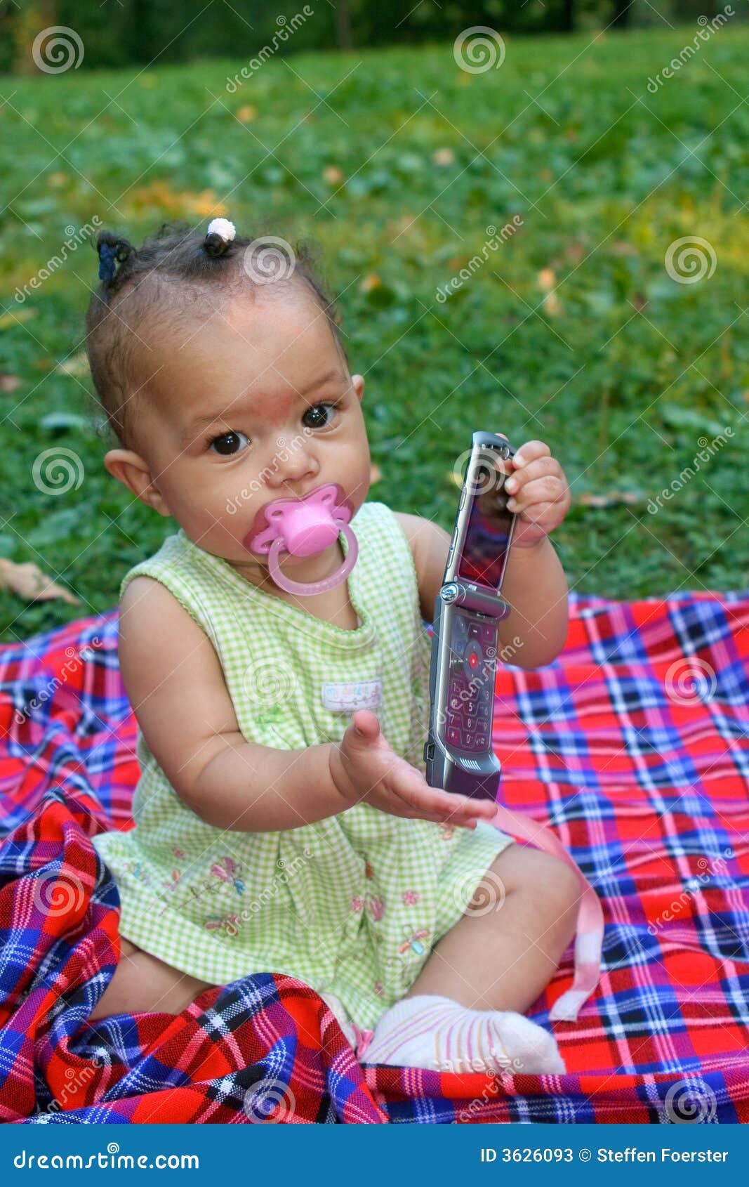Baby girl with cell phone stock image. Image of offspring 3626093