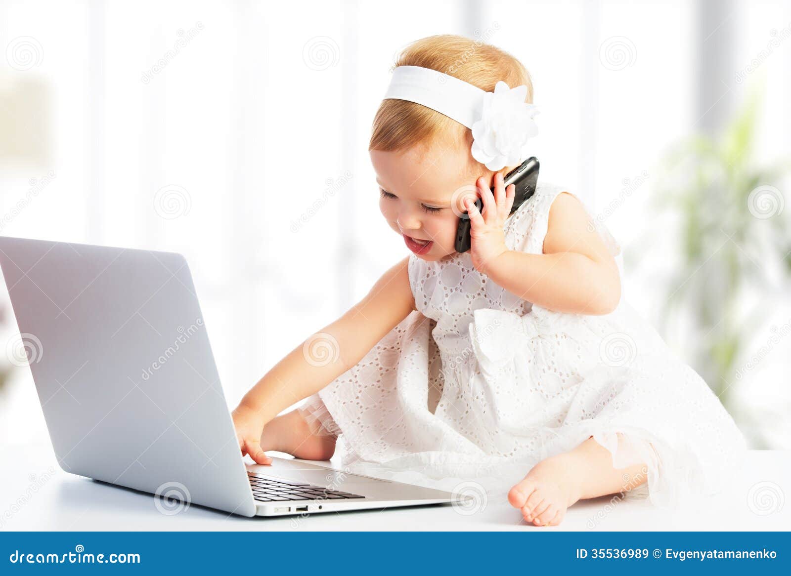 baby girl with computer laptop, mobile phone