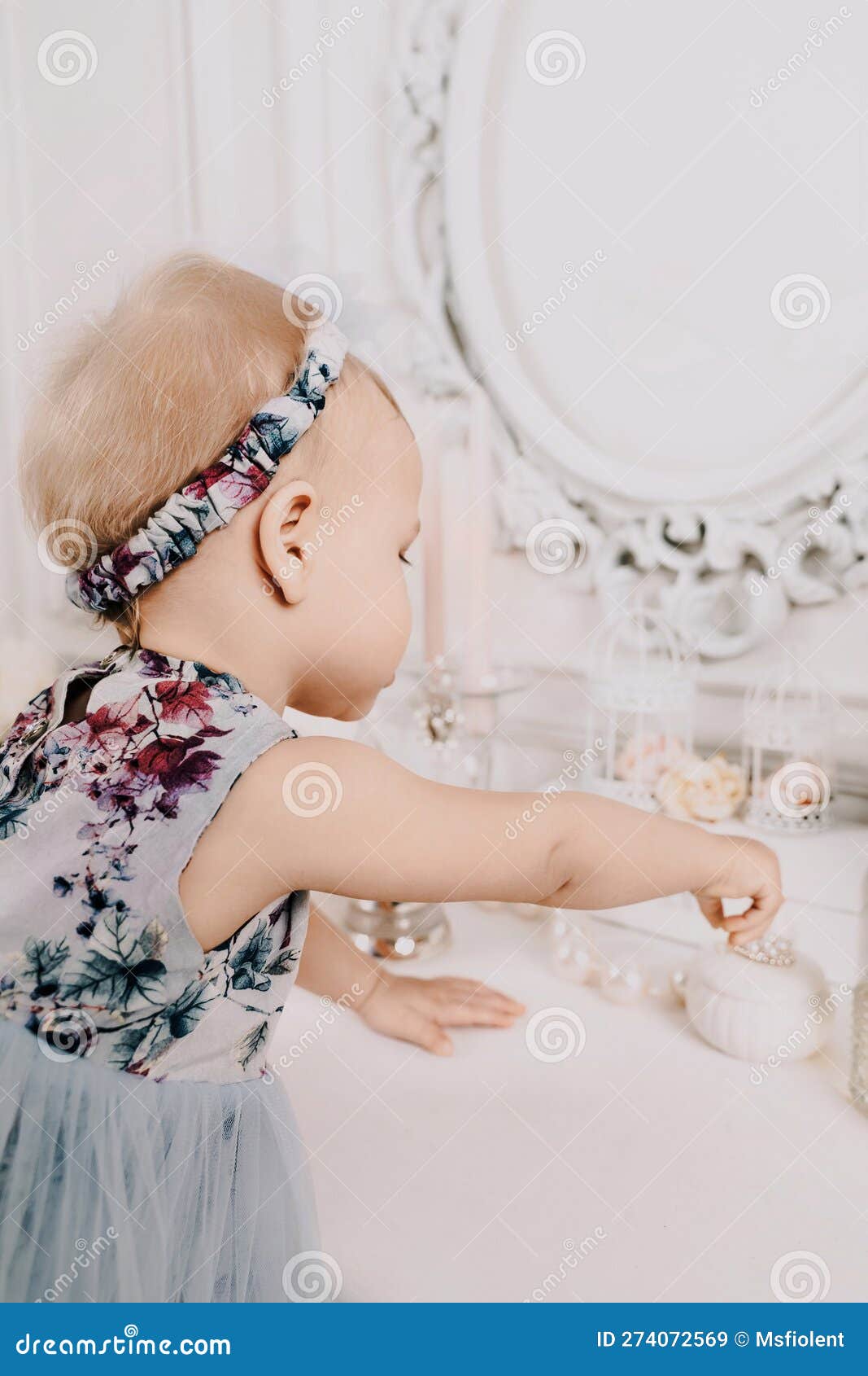 Baby Girl Elegant Dress. a One-year-old Girl in a Puffy Dress and a ...