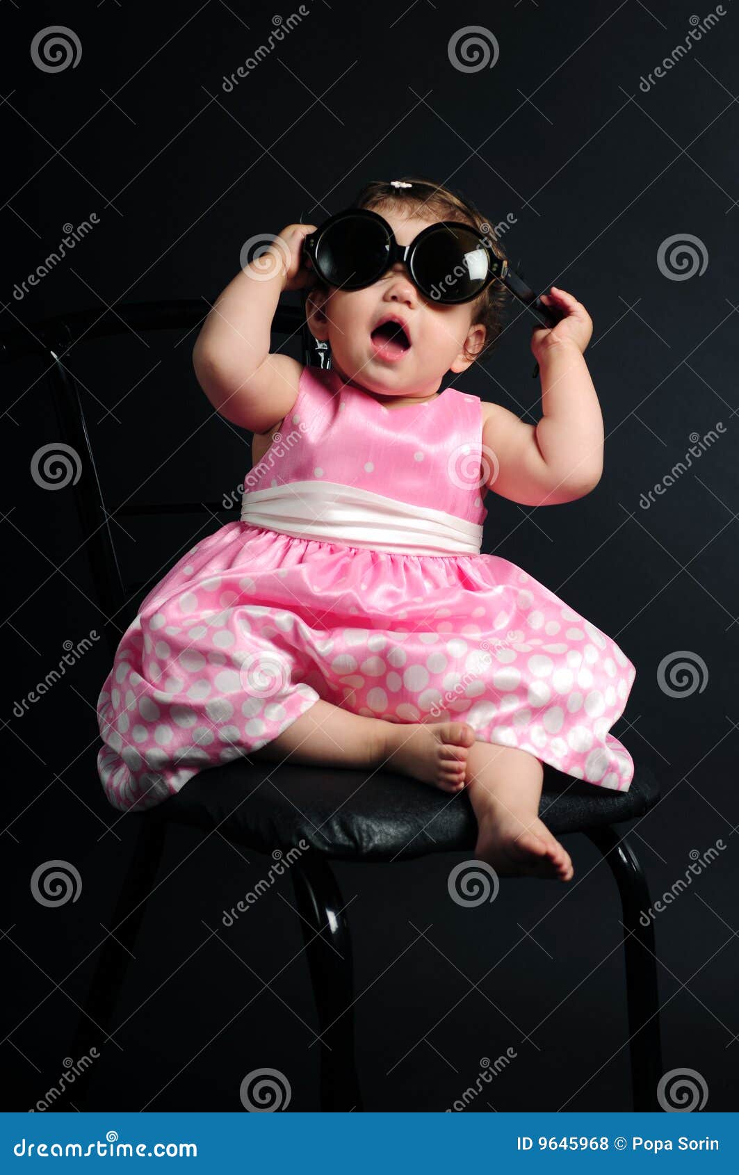 Baby girl with glasses stock photo. Image of studio, female 9645968