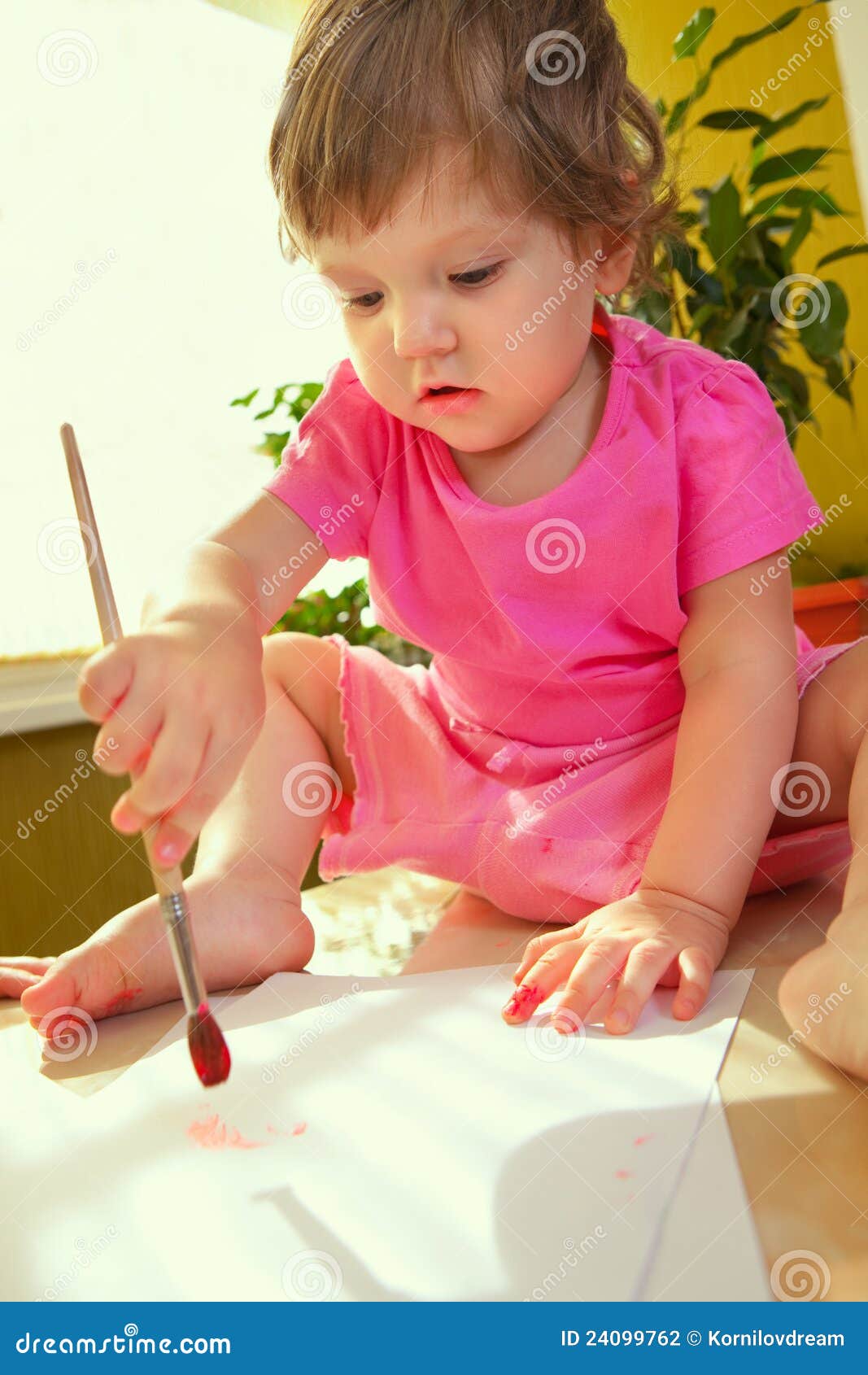 Baby girl with paint brush stock photo. Image of painter 24099762