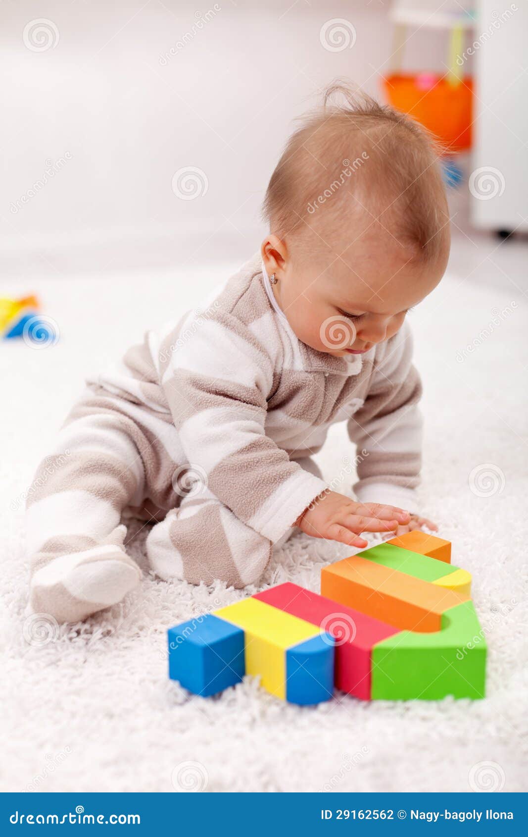 Baby Girl Playing Eith Wooden Blocks Stock Photography - Image 