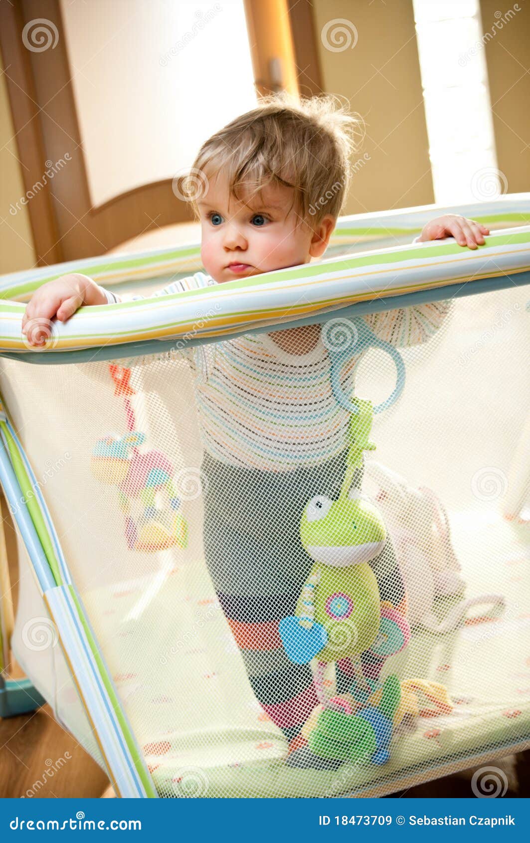 baby in playpen