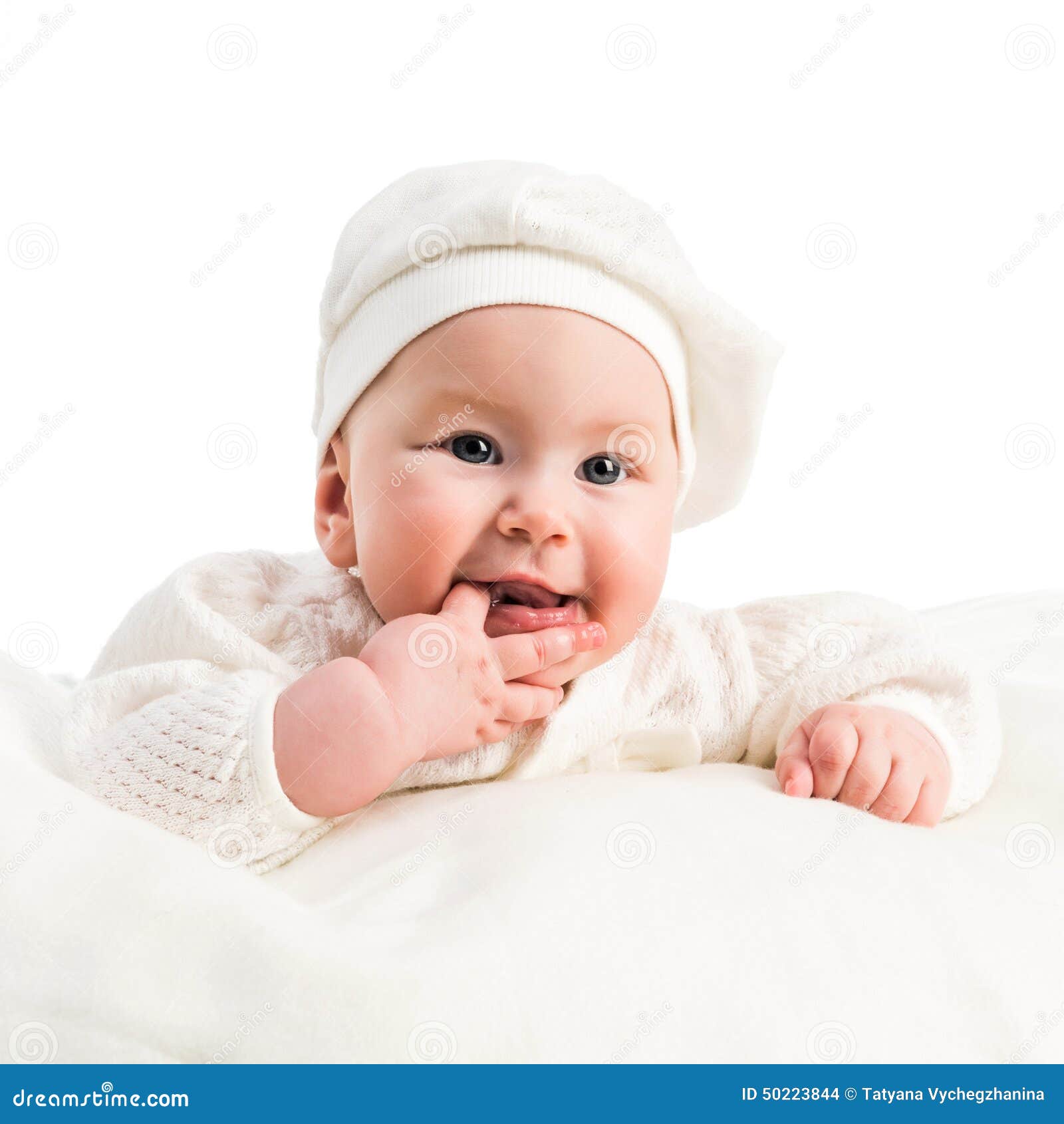 Baby Girl in a White Cap and a Jacket Stock Photo Image of living