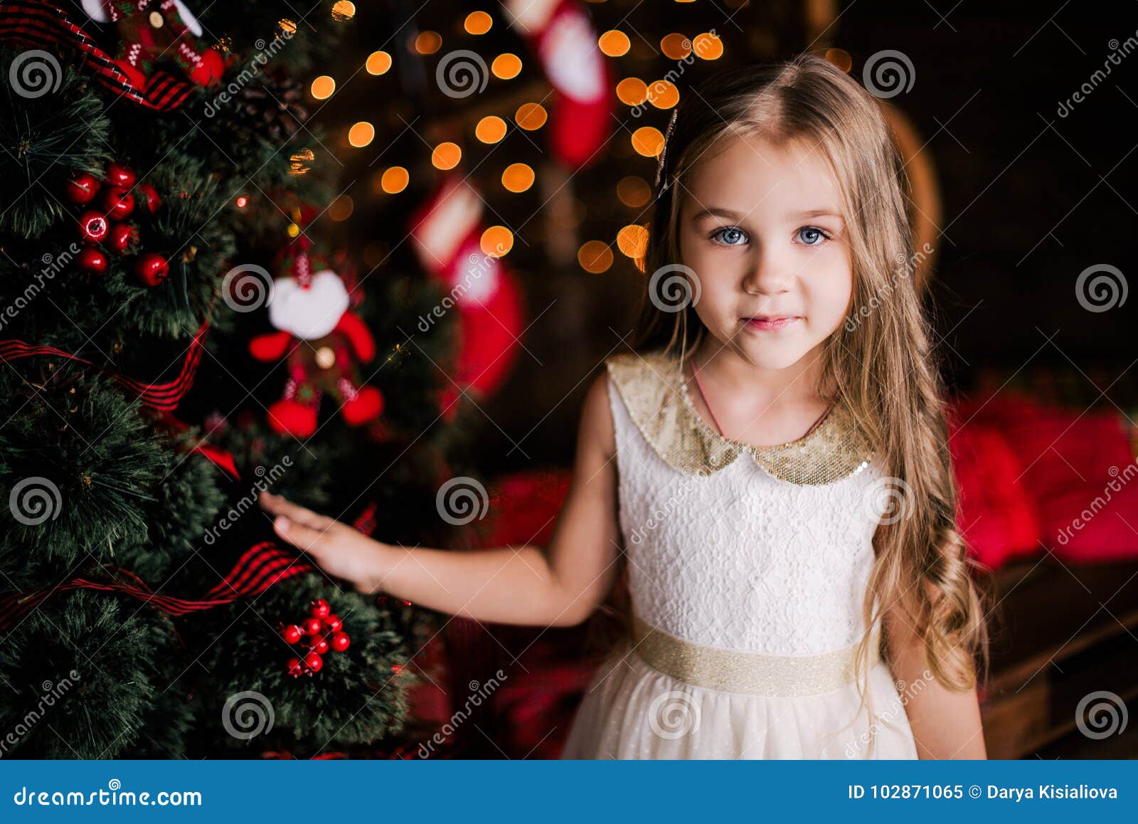 Baby Girl 4-5 Year Old Posing in Room Over Christmas Tree with ...