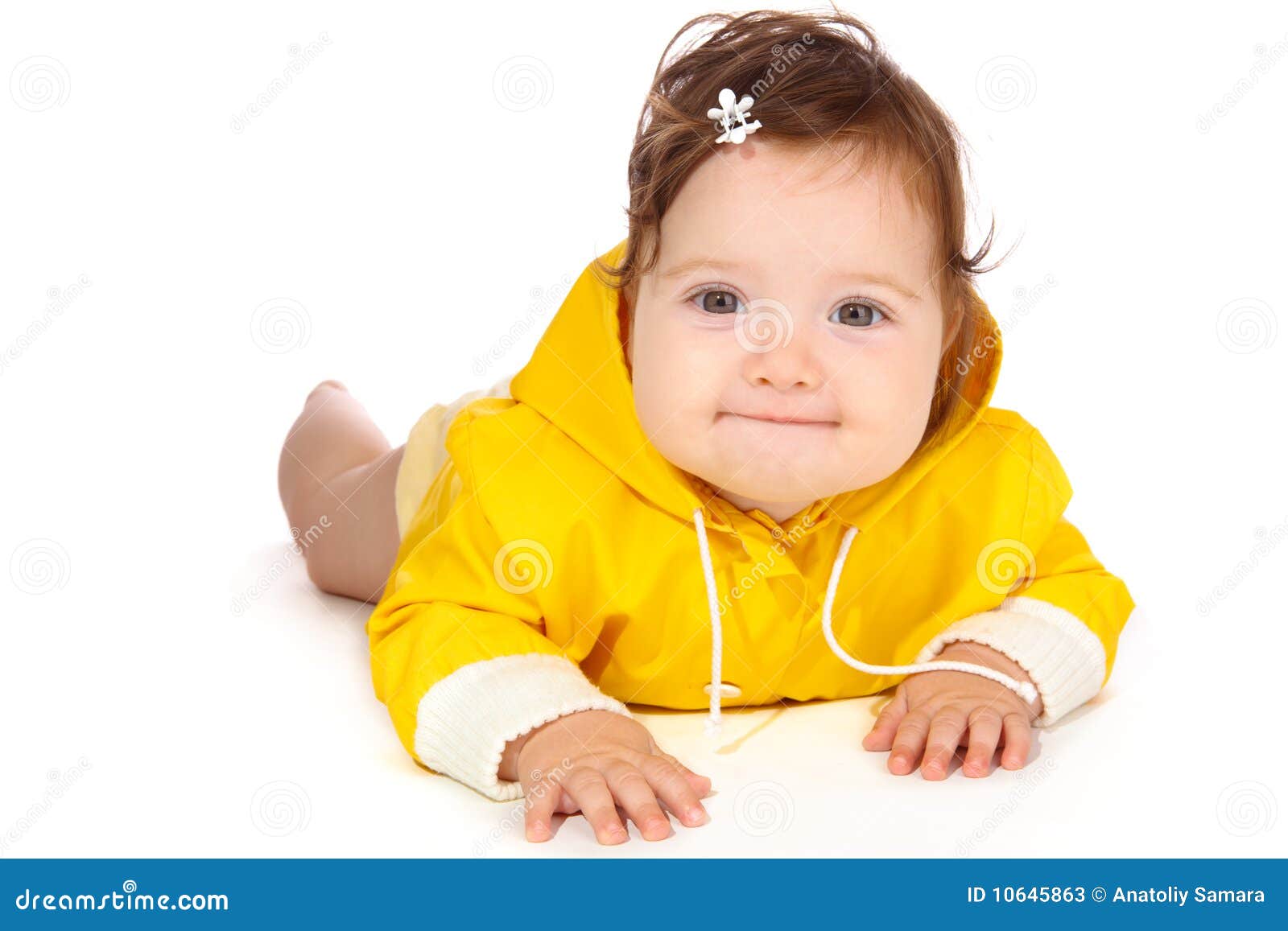 Baby girl in yellow stock image. Image of toddler, lying 10645863