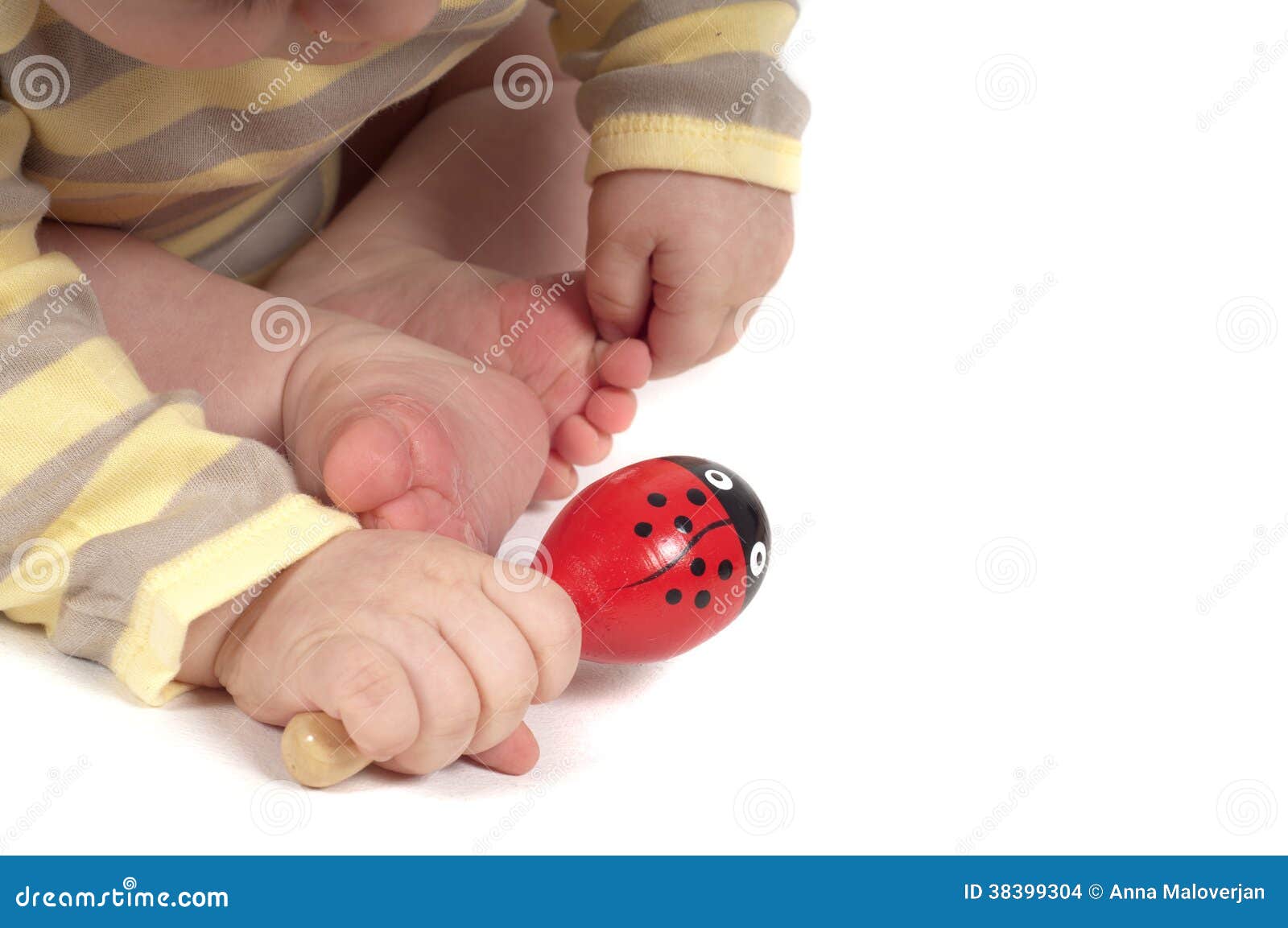 Baby hand with red toy stock photo. Image of childhood 38399304