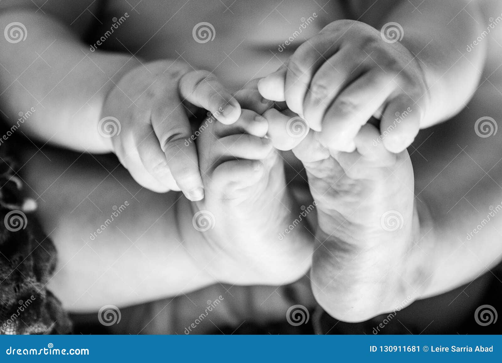 Baby hands and feet stock image. Image of holding, little 130911681