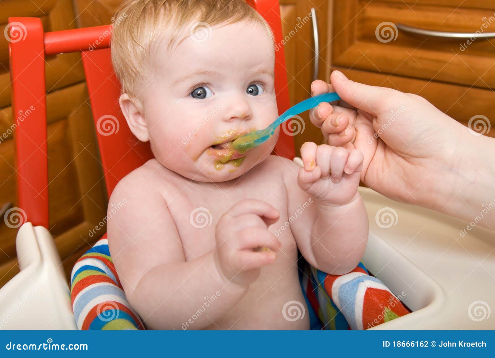 Baby Has First Food stock photo. Image of baby, feeding 18666162