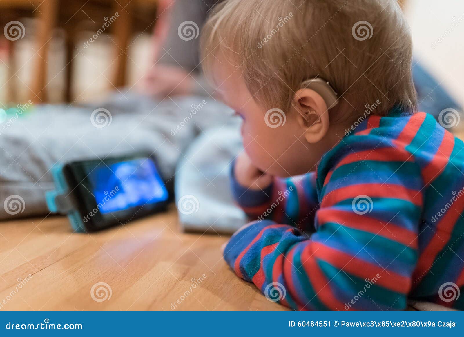 baby with hearing aid