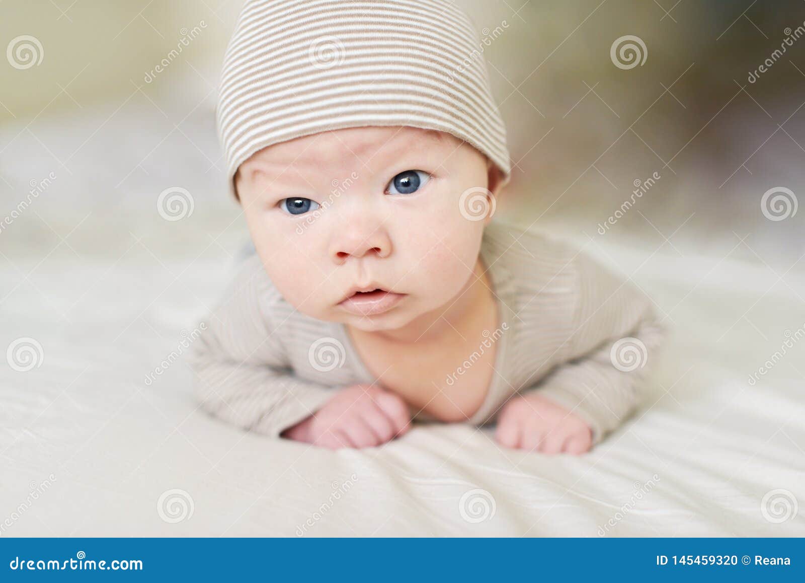 Baby keeps his head stock photo. Image of cute, adorable 145459320