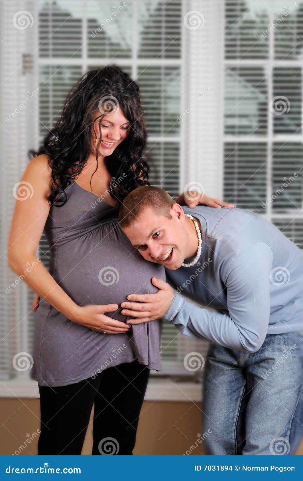 Baby Kicking stock photo. Image of prenatal, daddy, expecting 7031894