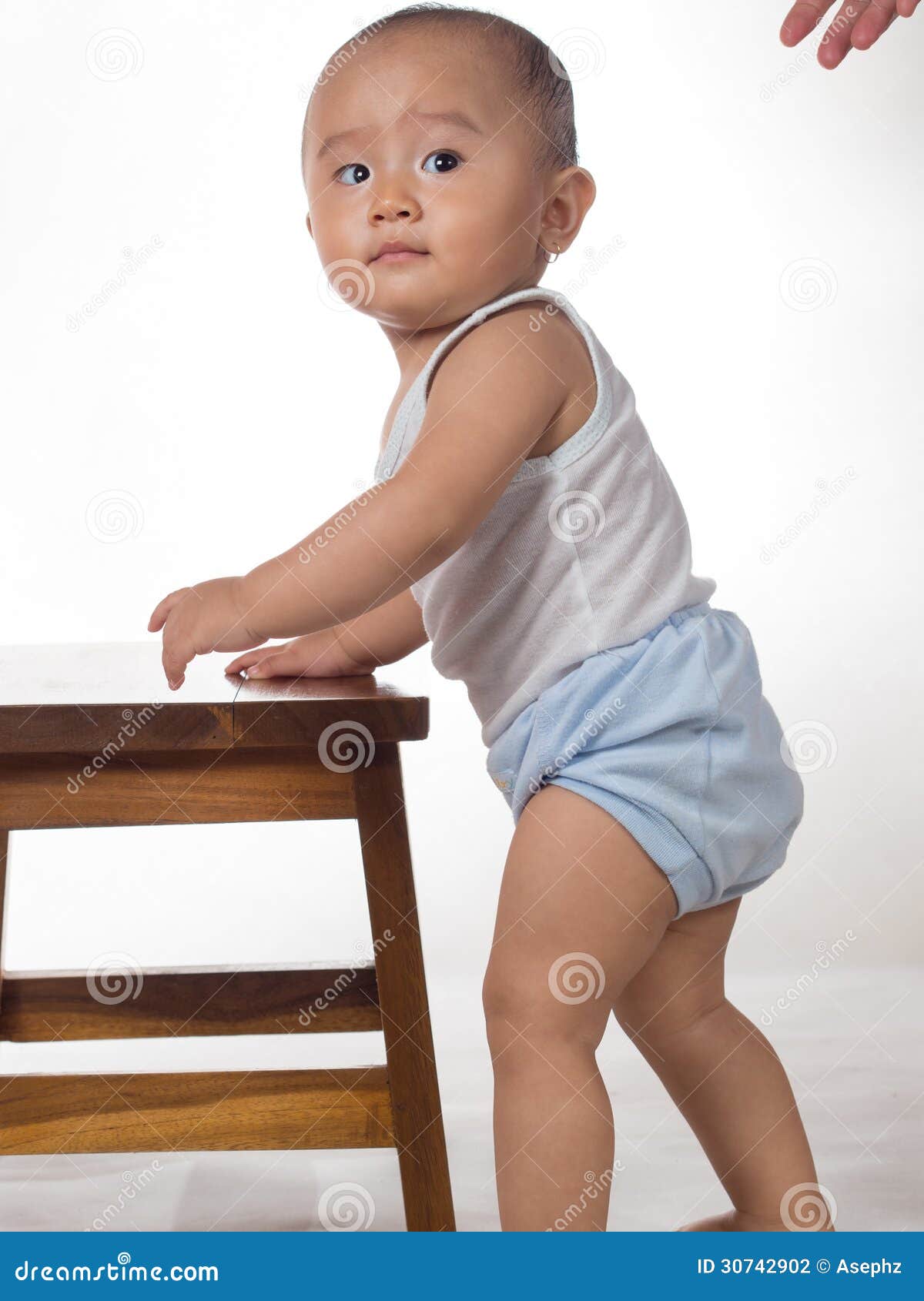 baby learning to stand