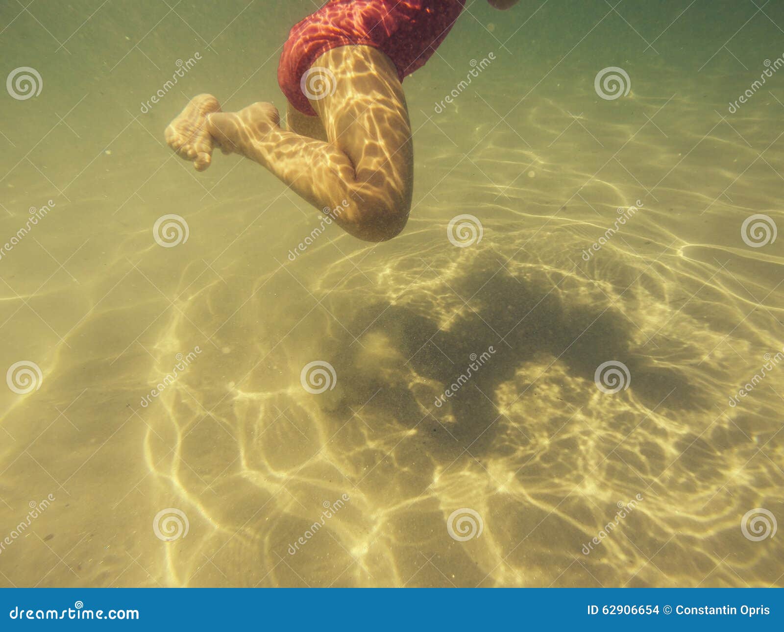 Baby Legs Kicking Underwater Stock Photo Image of kicking, seashore
