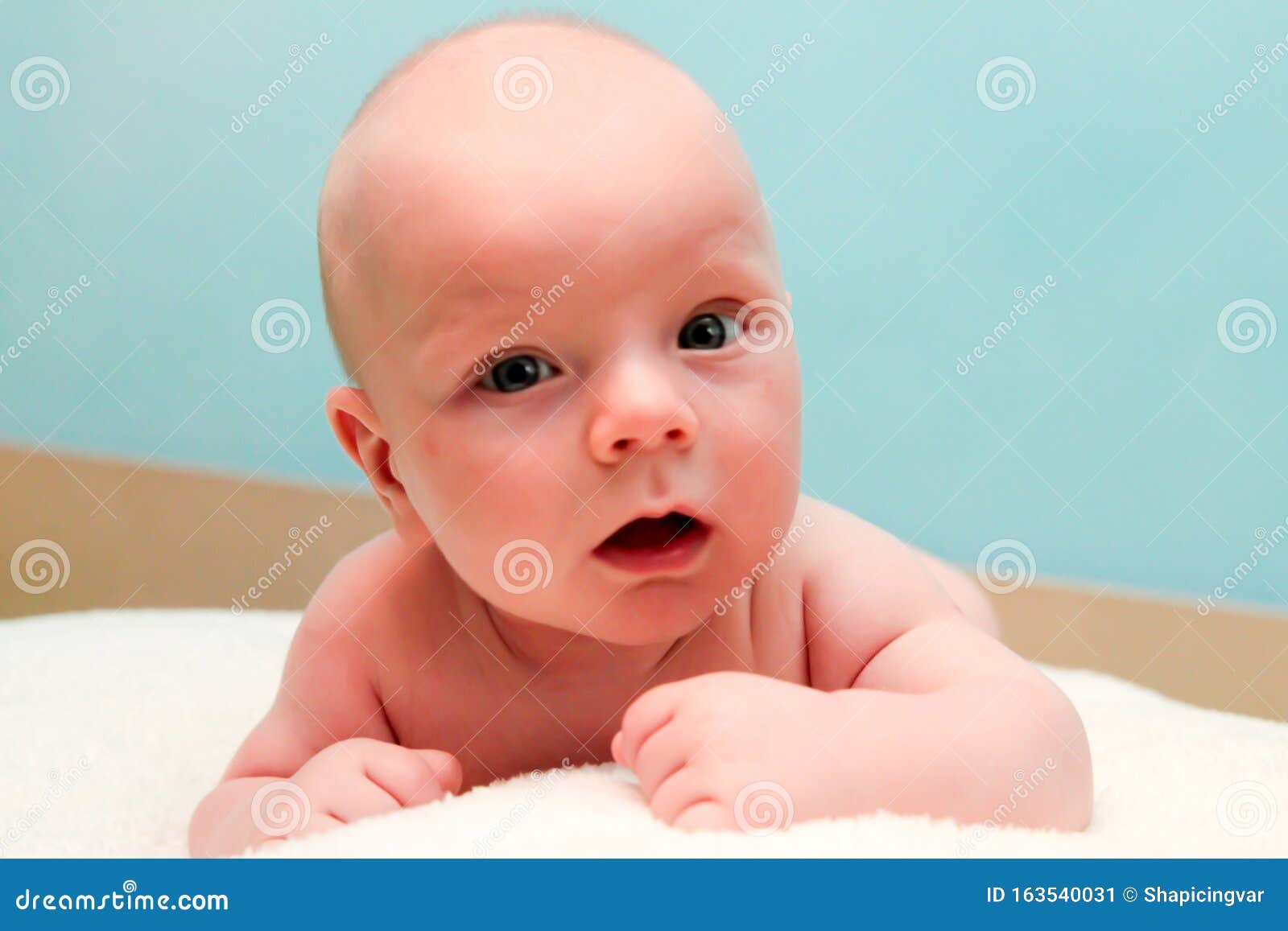Baby Looks into the Camera Lens Stock Image Image of small, sweet 163540031