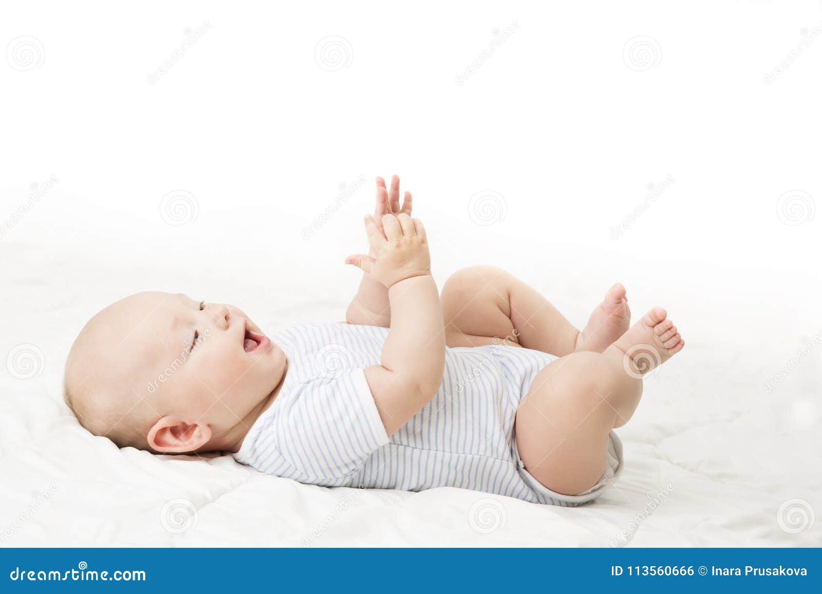 Baby Lying On Back Happy Infant Kid In Blue Bodysuit Beautiful Stock