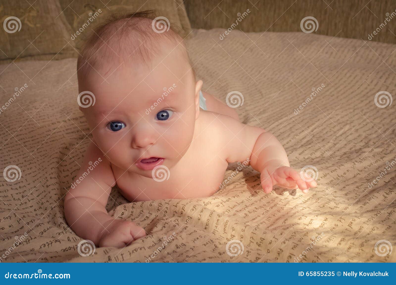 Baby Lying On His Stomach Stock Image Image Of Cheerful 65855235