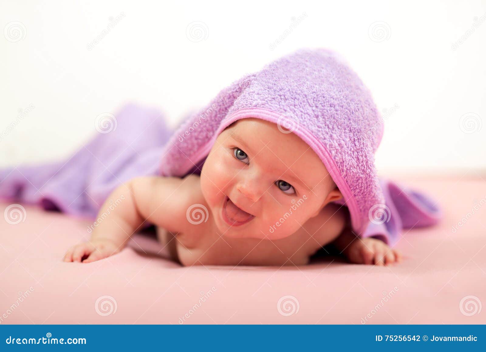 Baby lying on his stomach stock photo. Image of baby 75256542