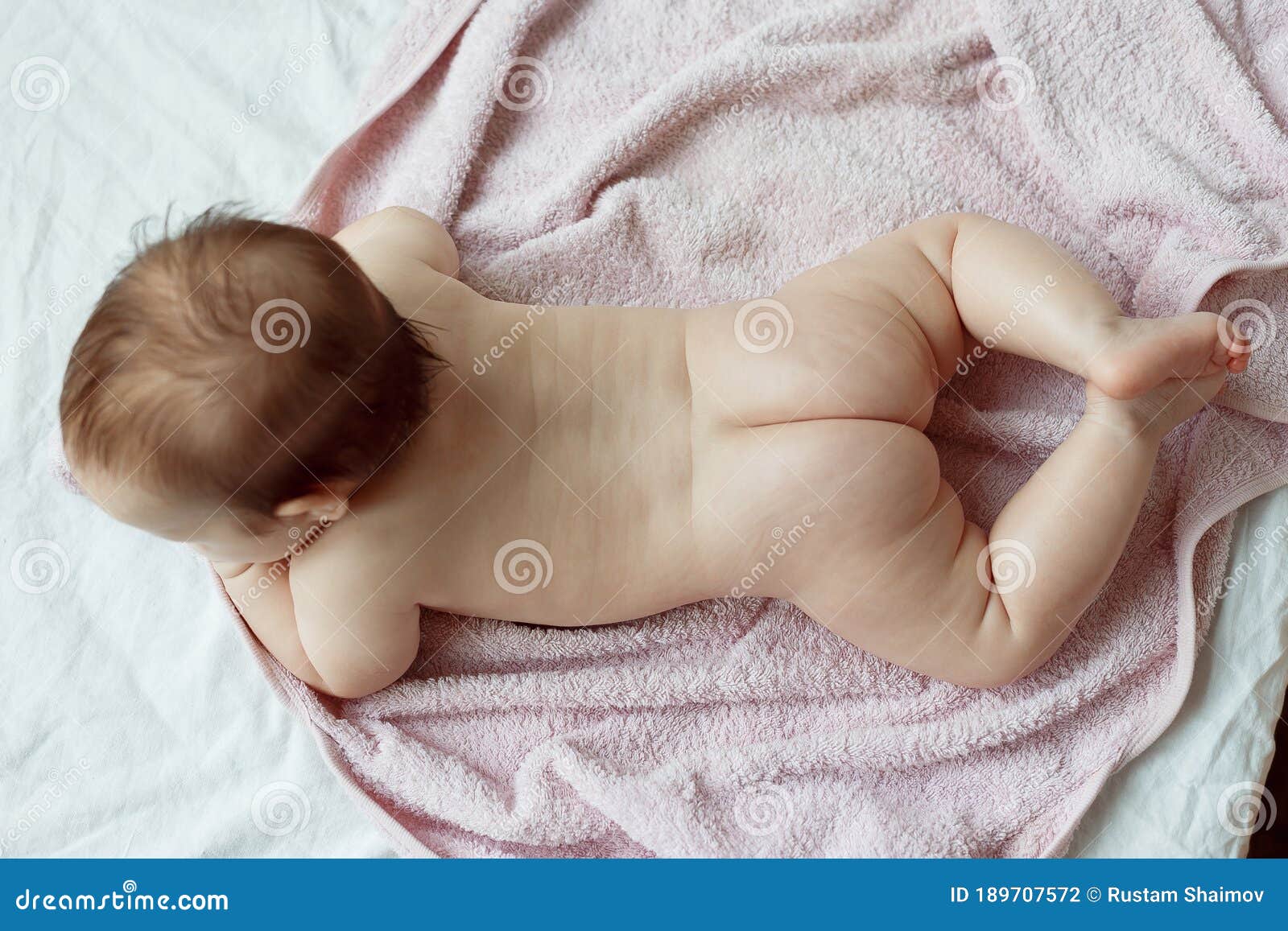 Baby Is Lying On A Pink Towel View From Above Stock Photo Image Of Caucasian Home Baby Is Lying On A Pink Towel View From Above Stock Photo Image Of Caucasian Home