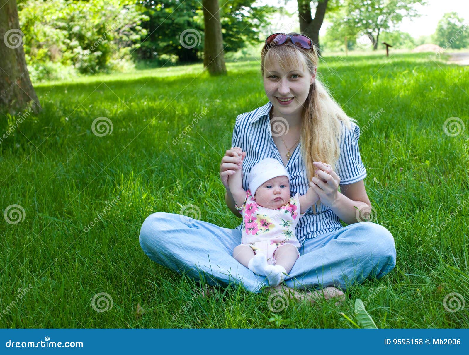 Baby and Mom Outdoors stock photo. Image of care, motherhood 9595158