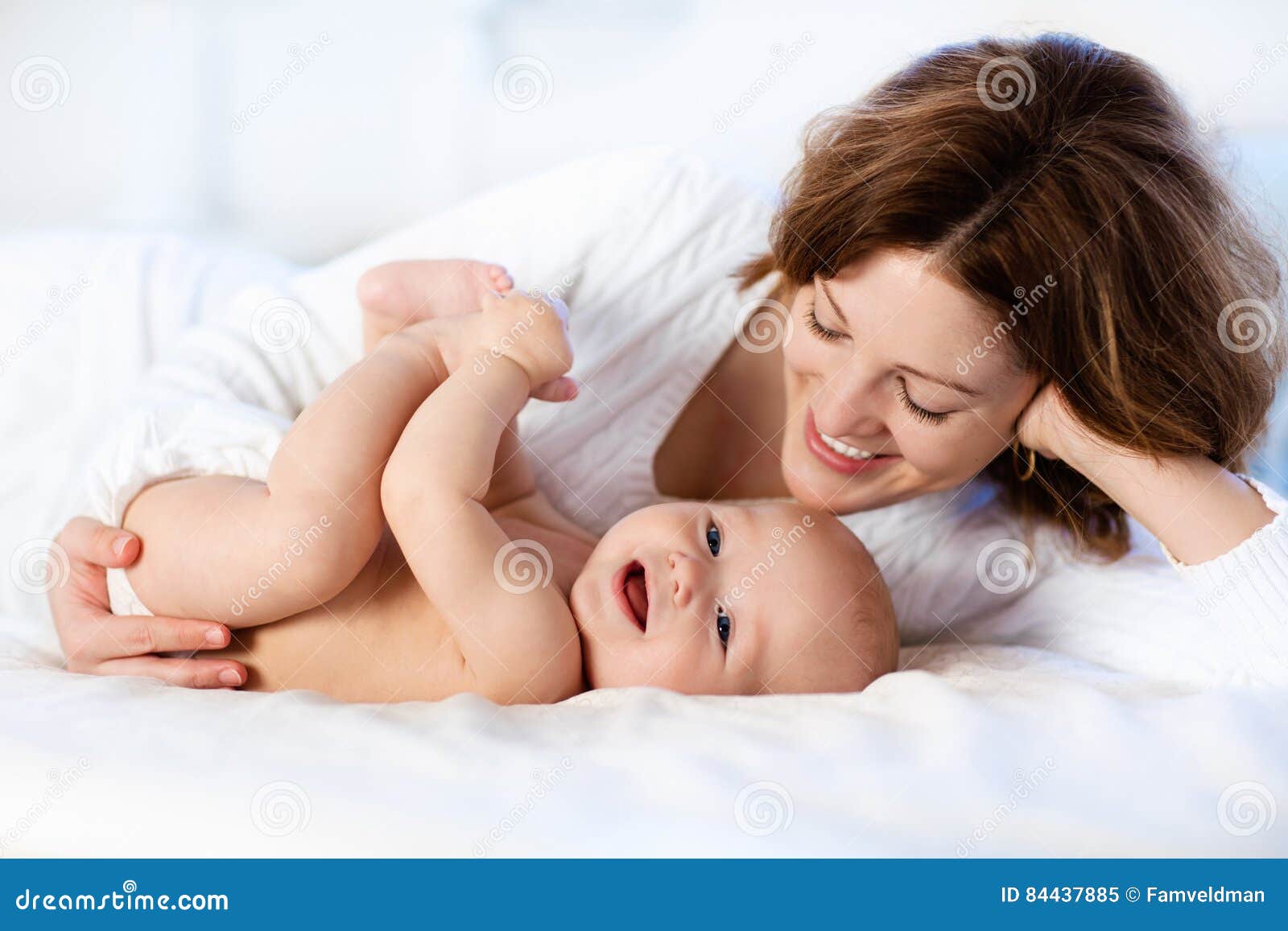 baby and mother at home. mom and child.