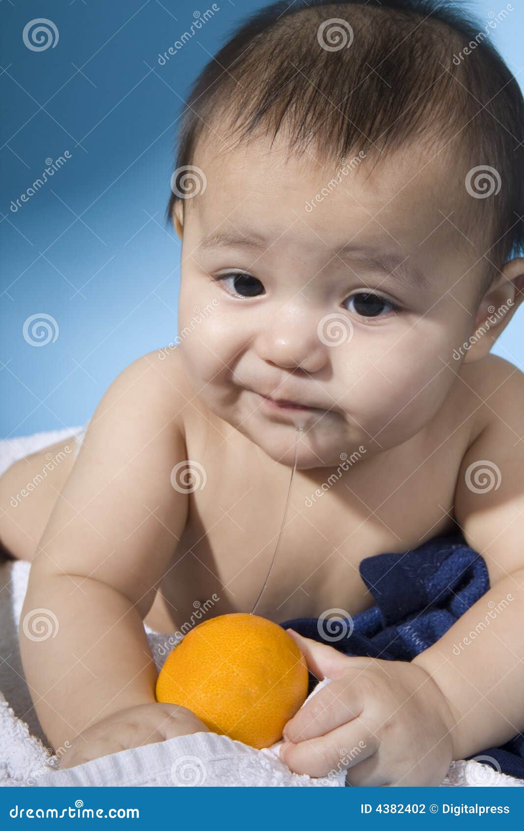 Baby with orange stock photo. Image of fruit, benefit - 4382402