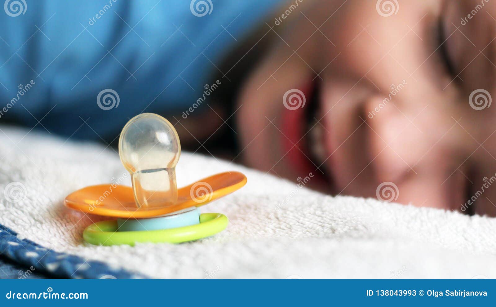 Baby Orange Pacifier and Baby Sleeping, Smile Stock Image Image of